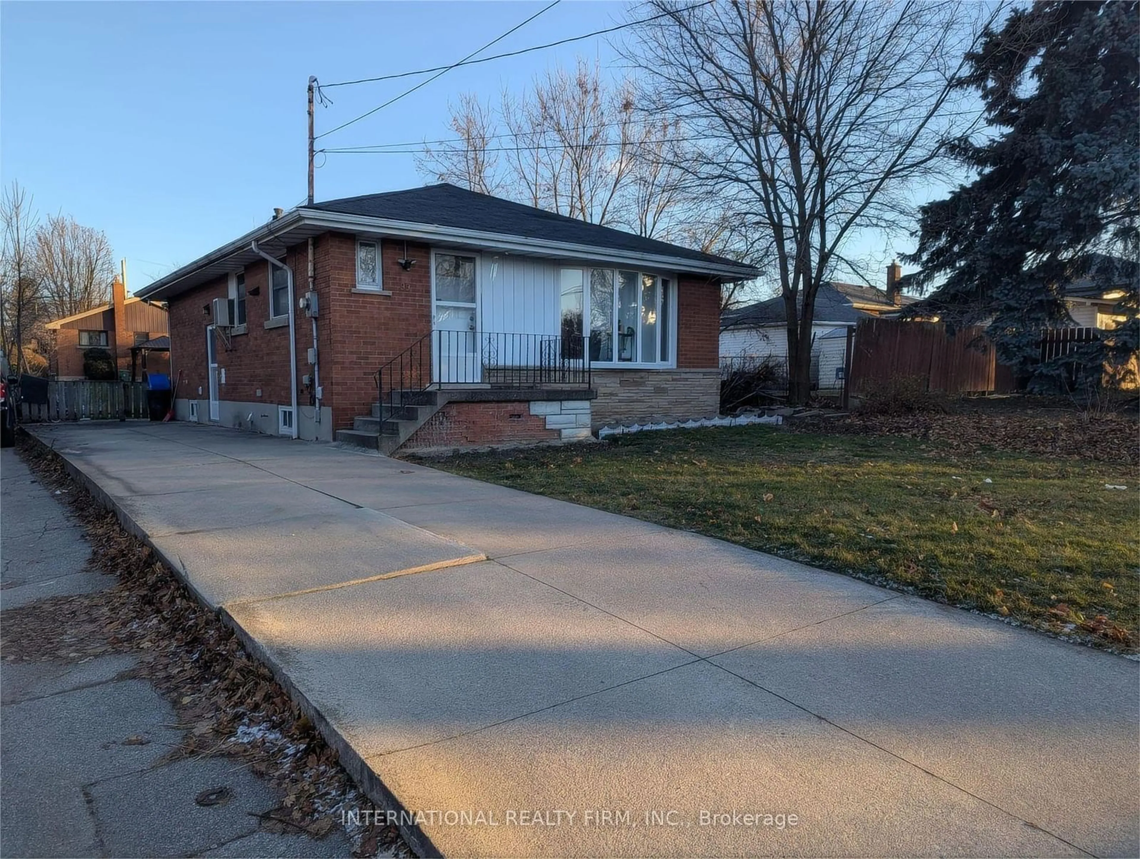 Home with brick exterior material, street for 99 West 4th St, Hamilton Ontario L9C 3M8