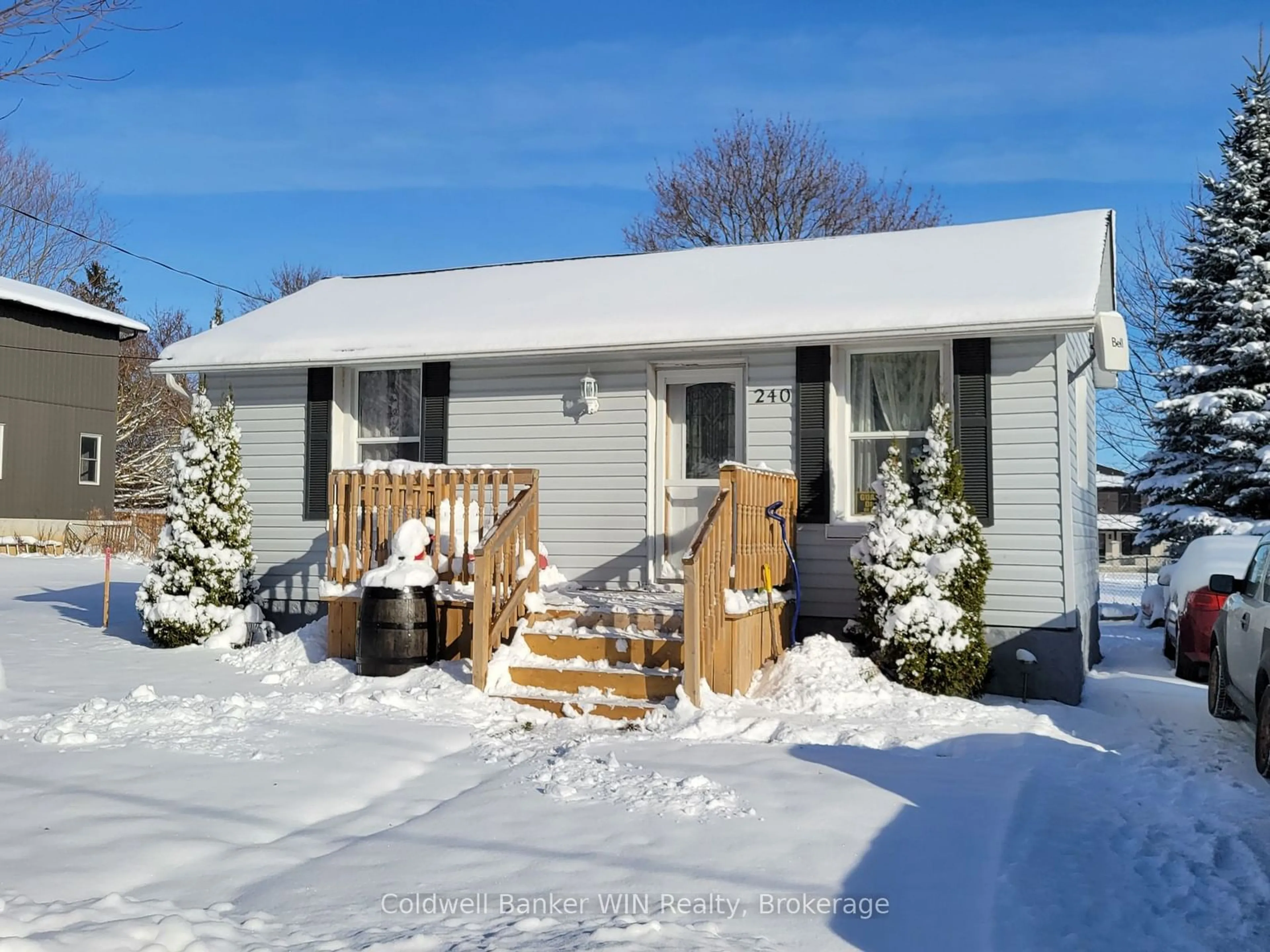 Home with vinyl exterior material, street for 240 Egremont St, Wellington North Ontario N0G 2L2