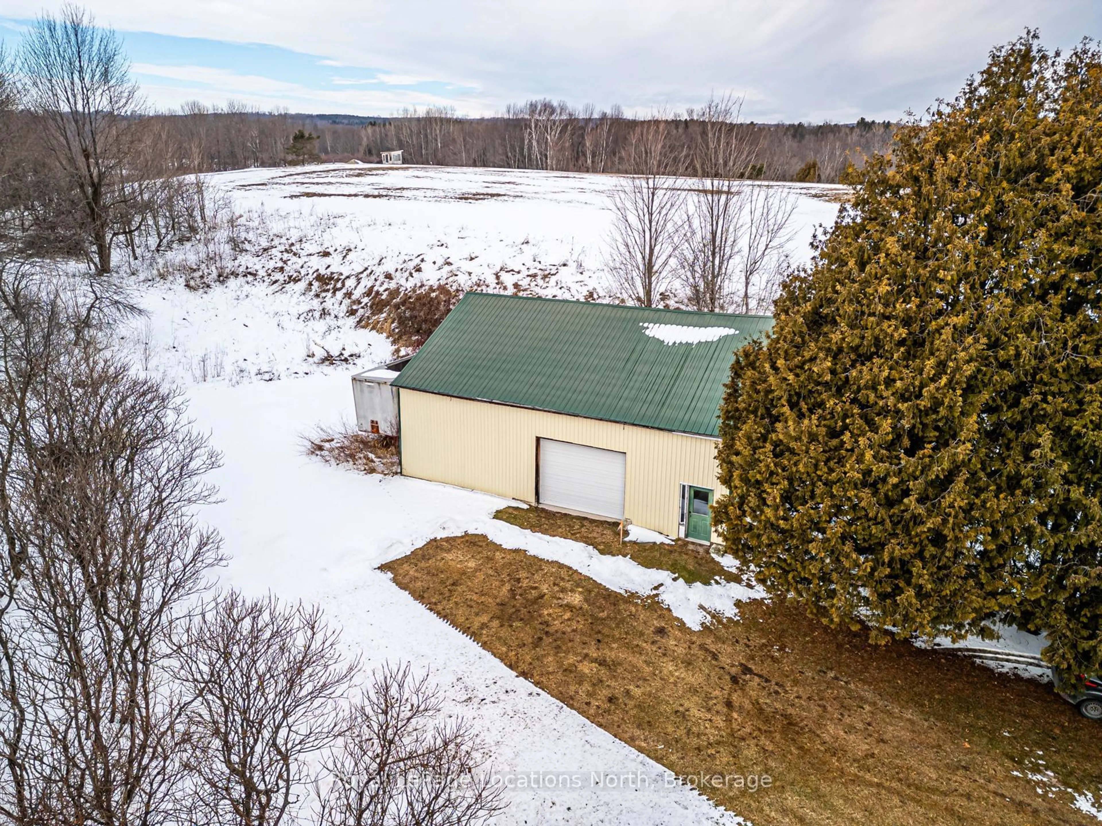 A pic from outside/outdoor area/front of a property/back of a property/a pic from drone, unknown for 158502 7TH Line, Meaford Ontario N4L 1W5