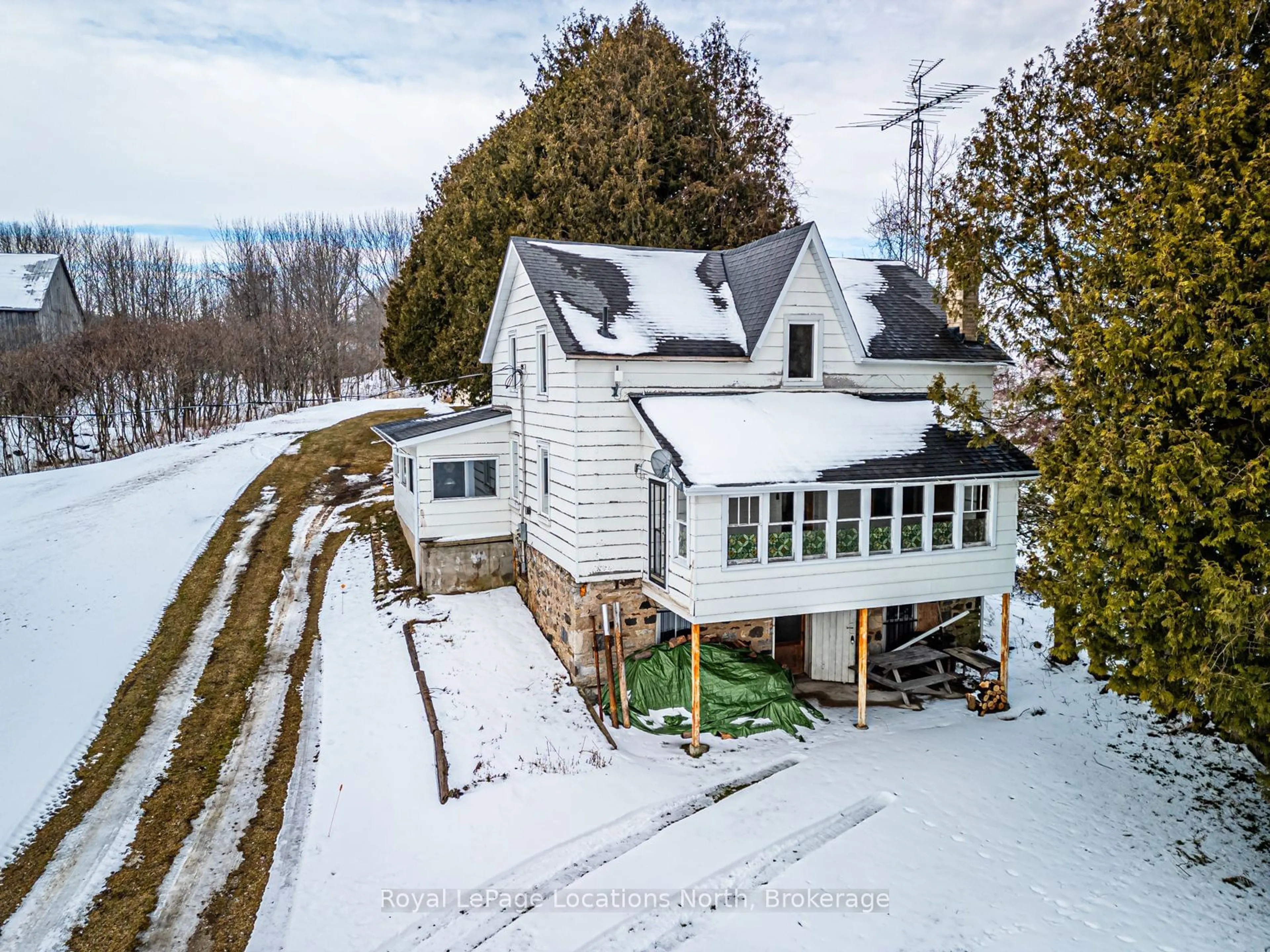 A pic from outside/outdoor area/front of a property/back of a property/a pic from drone, unknown for 158502 7TH Line, Meaford Ontario N4L 1W5