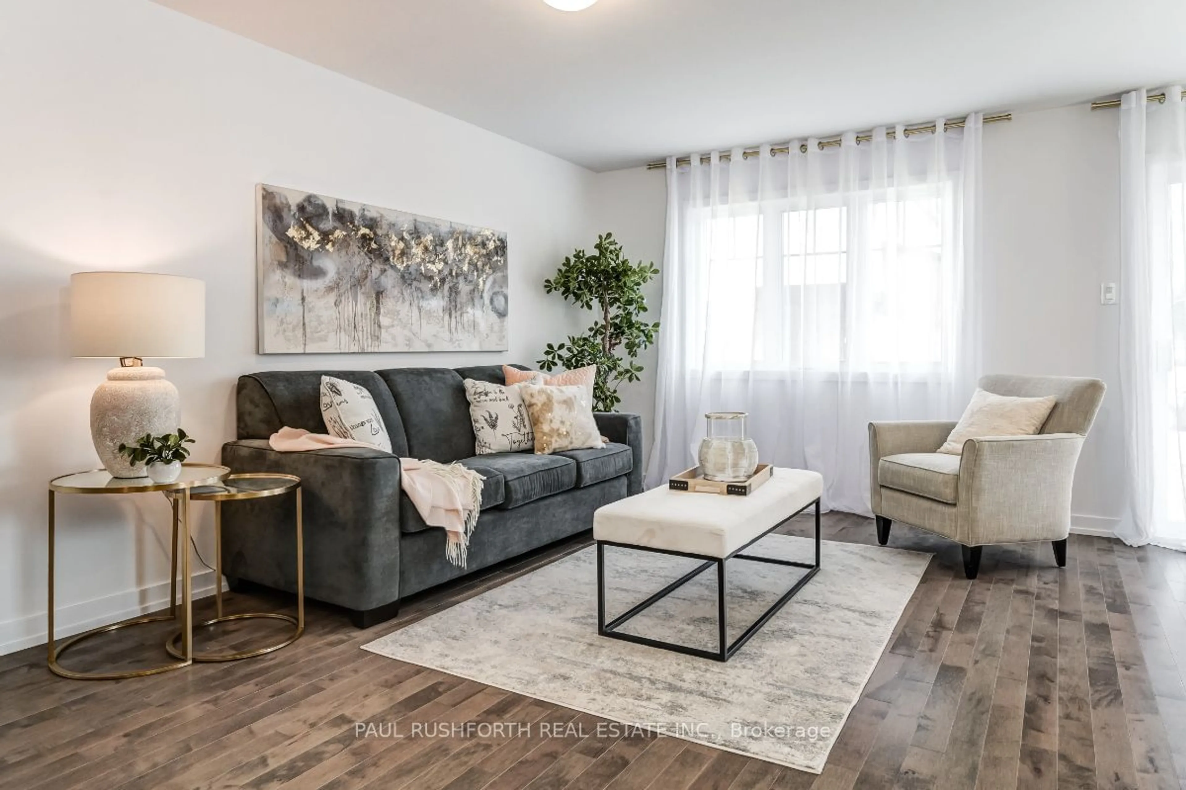 Living room with furniture, wood/laminate floor for 209 DARQUISE St, Clarence-Rockland Ontario K4K 0N9