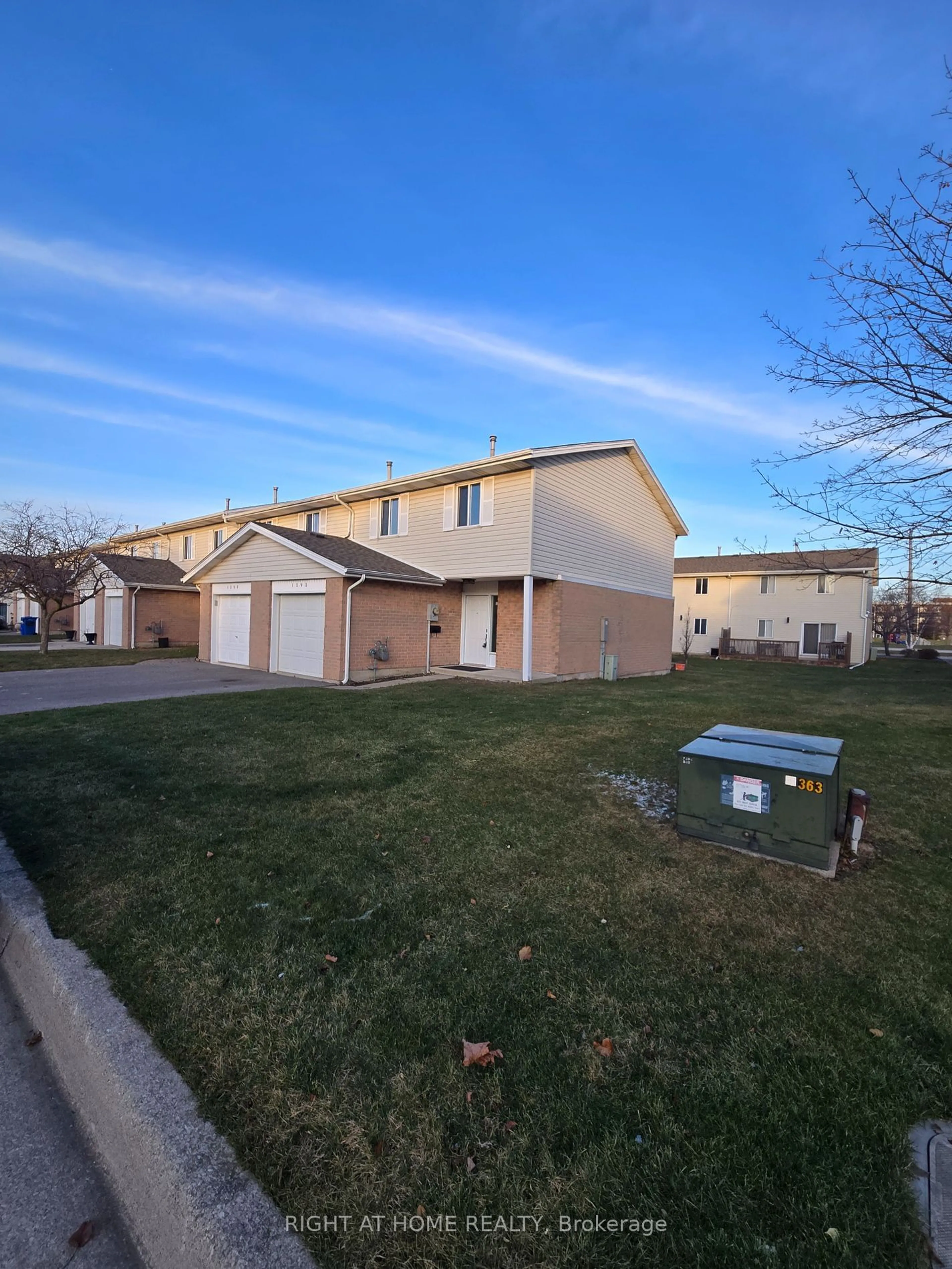 A pic from outside/outdoor area/front of a property/back of a property/a pic from drone, street for 1292 Cardinal Cres #63, Tecumseh Ontario N8N 4V1