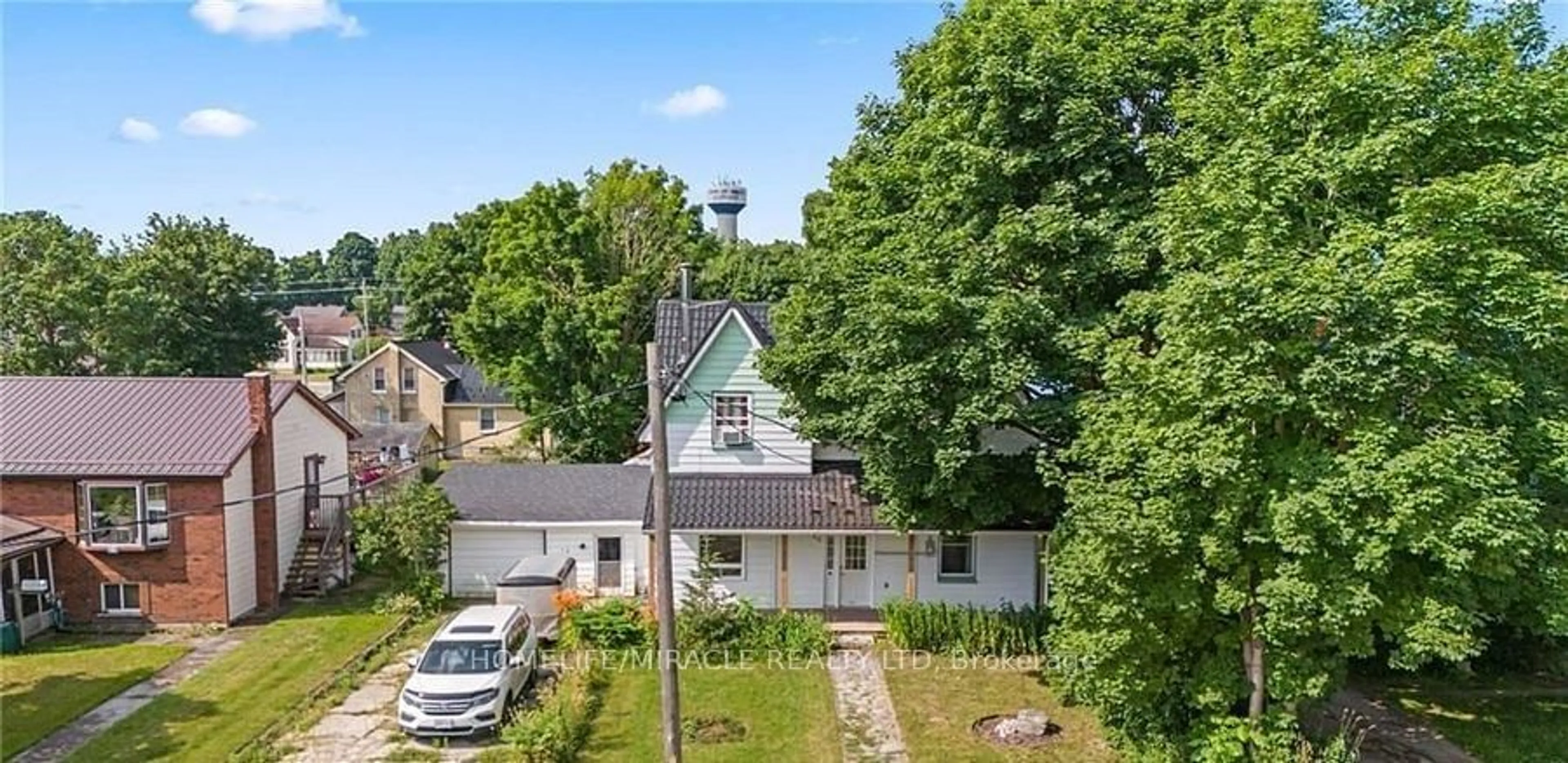 A pic from outside/outdoor area/front of a property/back of a property/a pic from drone, street for 22 William St, Minto Ontario N0G 1M0