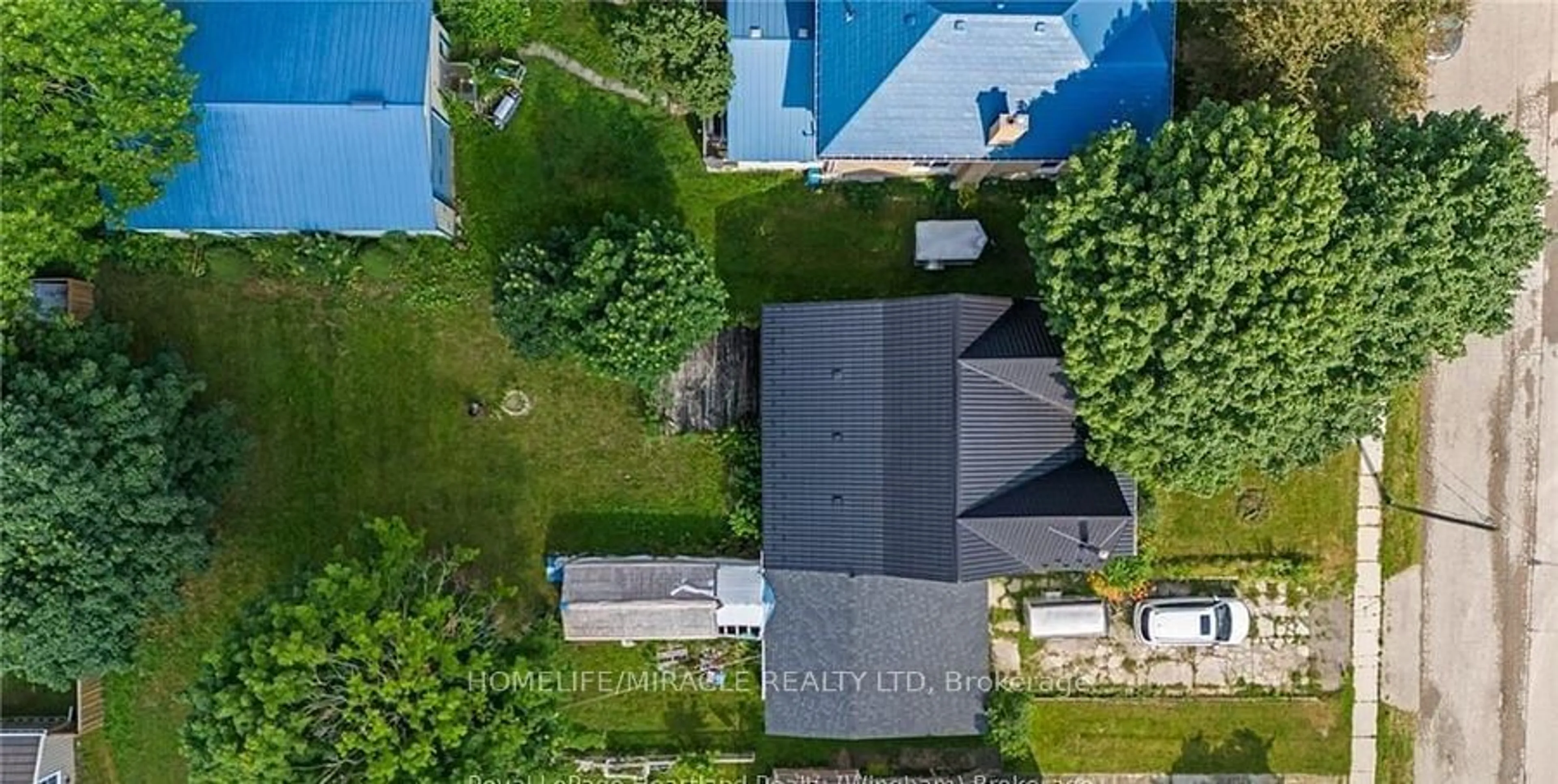 A pic from outside/outdoor area/front of a property/back of a property/a pic from drone, street for 22 William St, Minto Ontario N0G 1M0