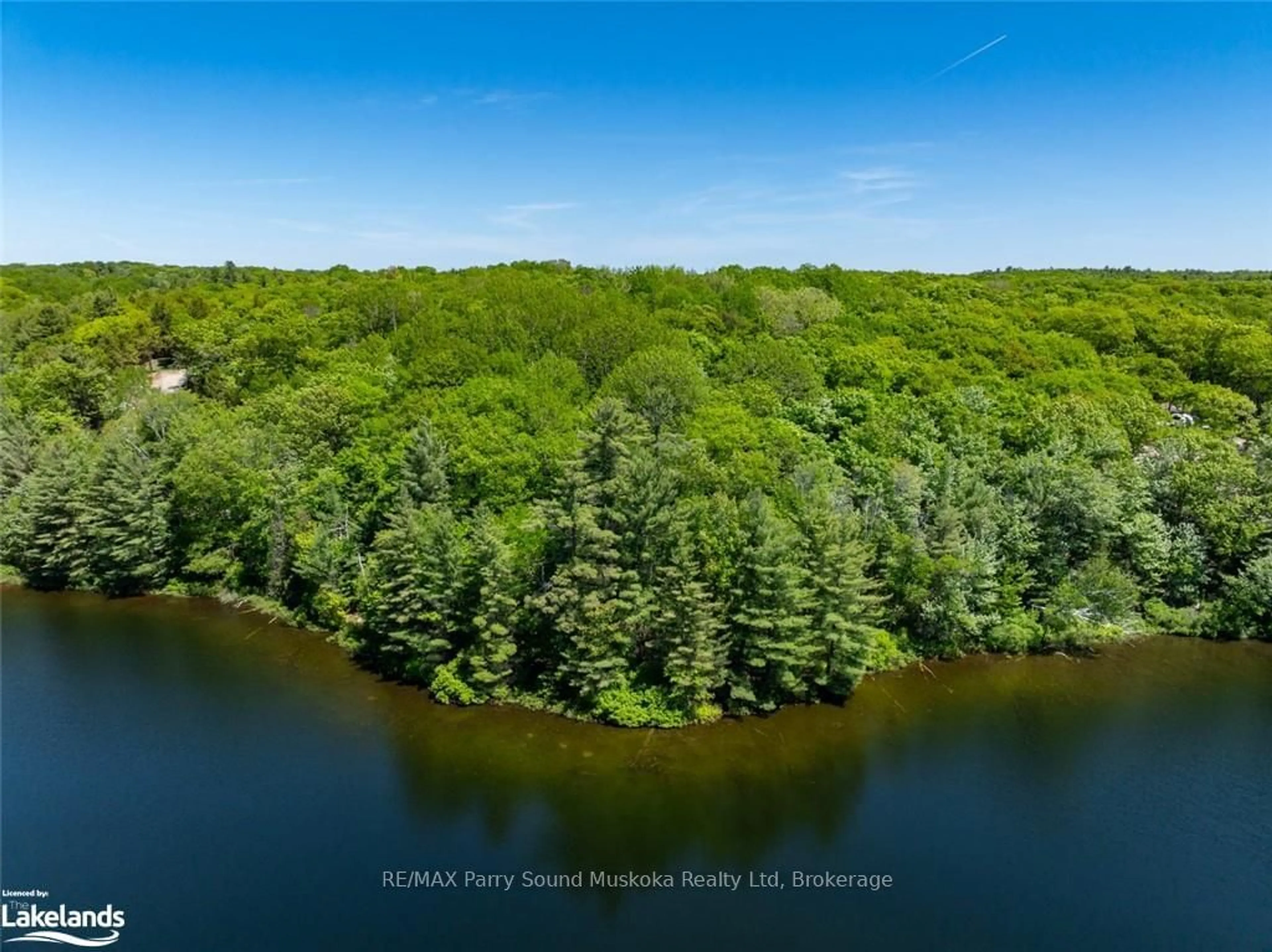 A pic from outside/outdoor area/front of a property/back of a property/a pic from drone, water/lake/river/ocean view for 21 WEE-GE-WA Rd, Seguin Ontario P2A 0B2