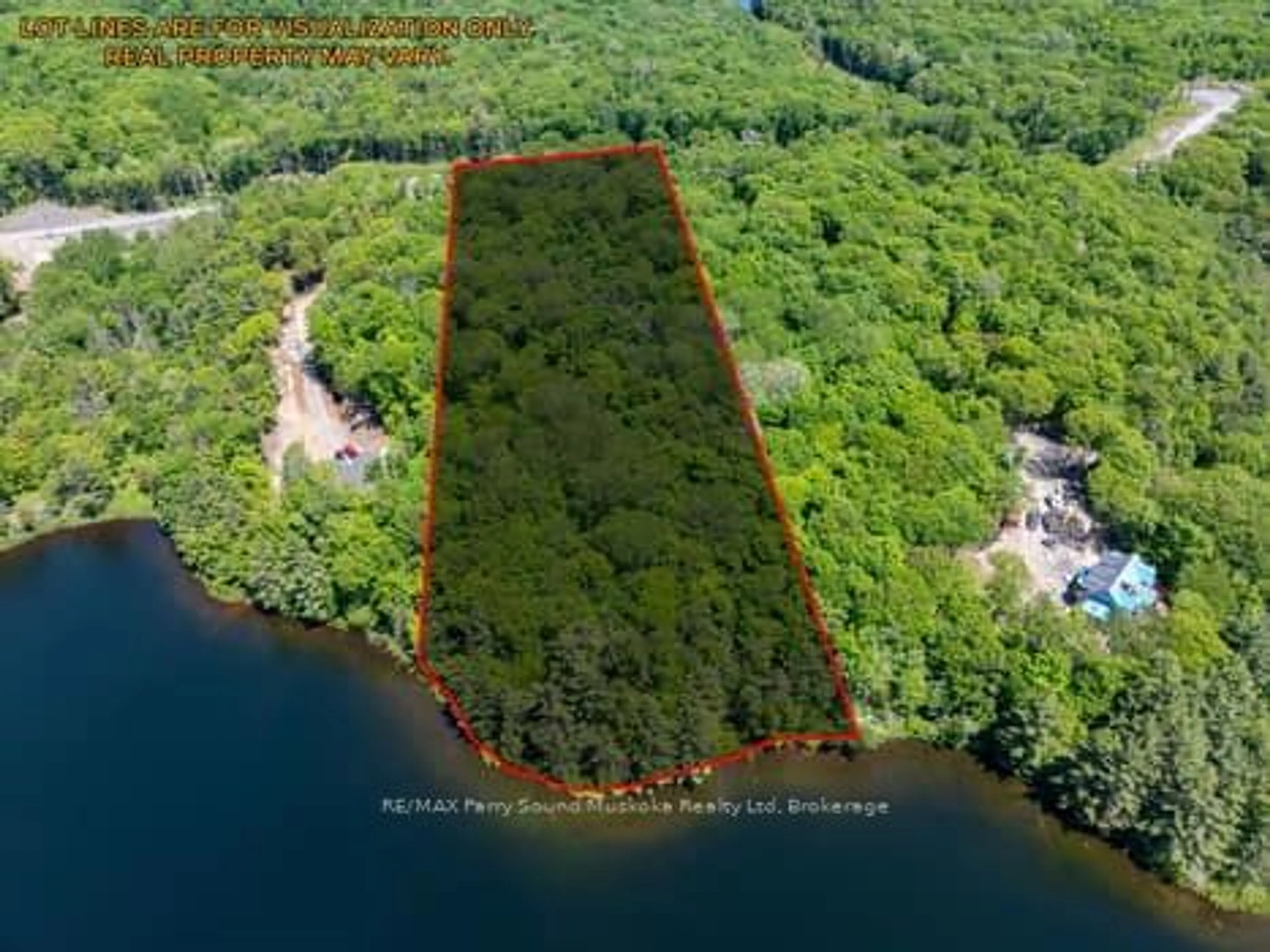 A pic from outside/outdoor area/front of a property/back of a property/a pic from drone, water/lake/river/ocean view for 21 WEE-GE-WA Rd, Seguin Ontario P2A 0B2