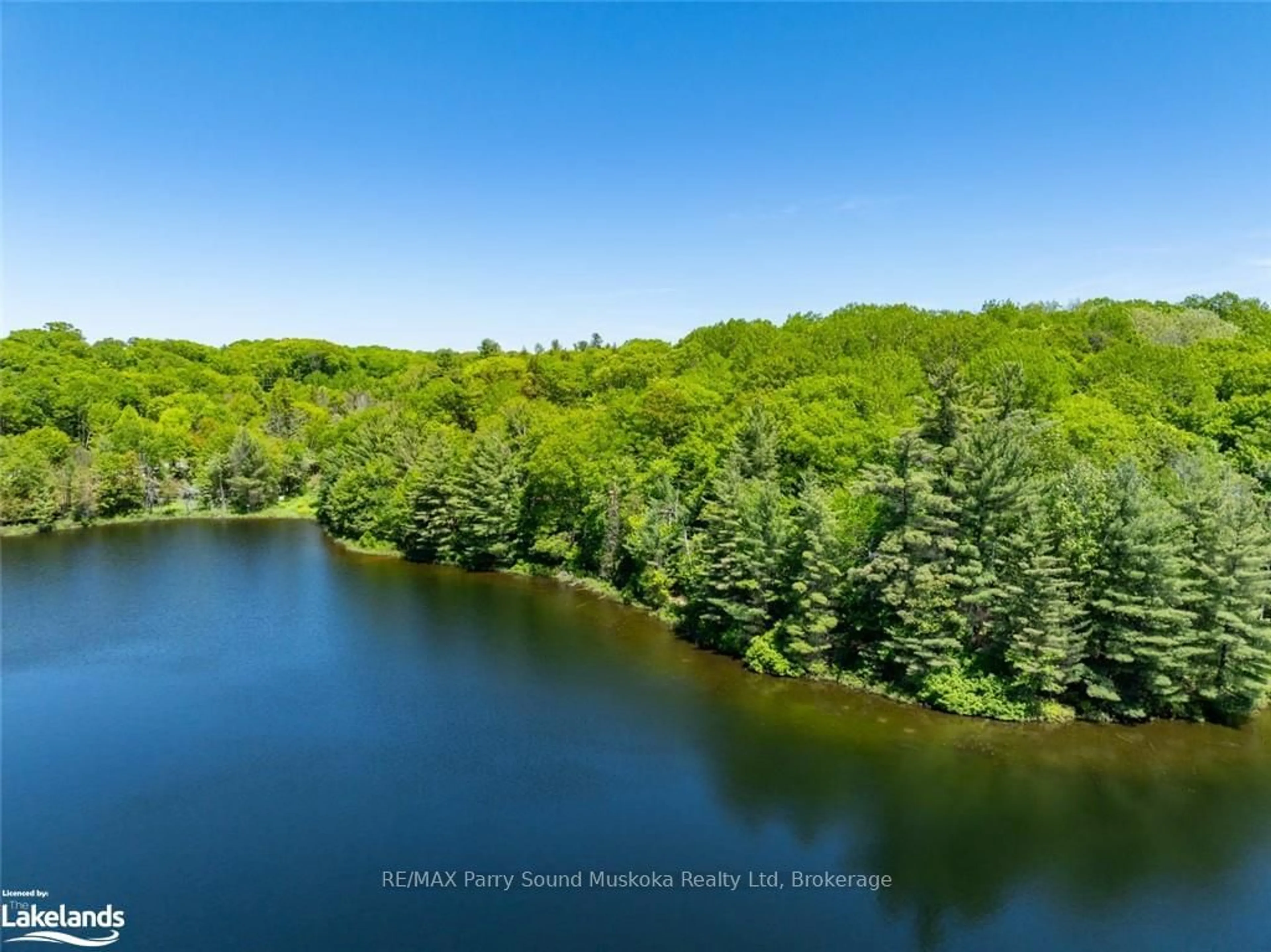 A pic from outside/outdoor area/front of a property/back of a property/a pic from drone, water/lake/river/ocean view for 21 WEE-GE-WA Rd, Seguin Ontario P2A 0B2