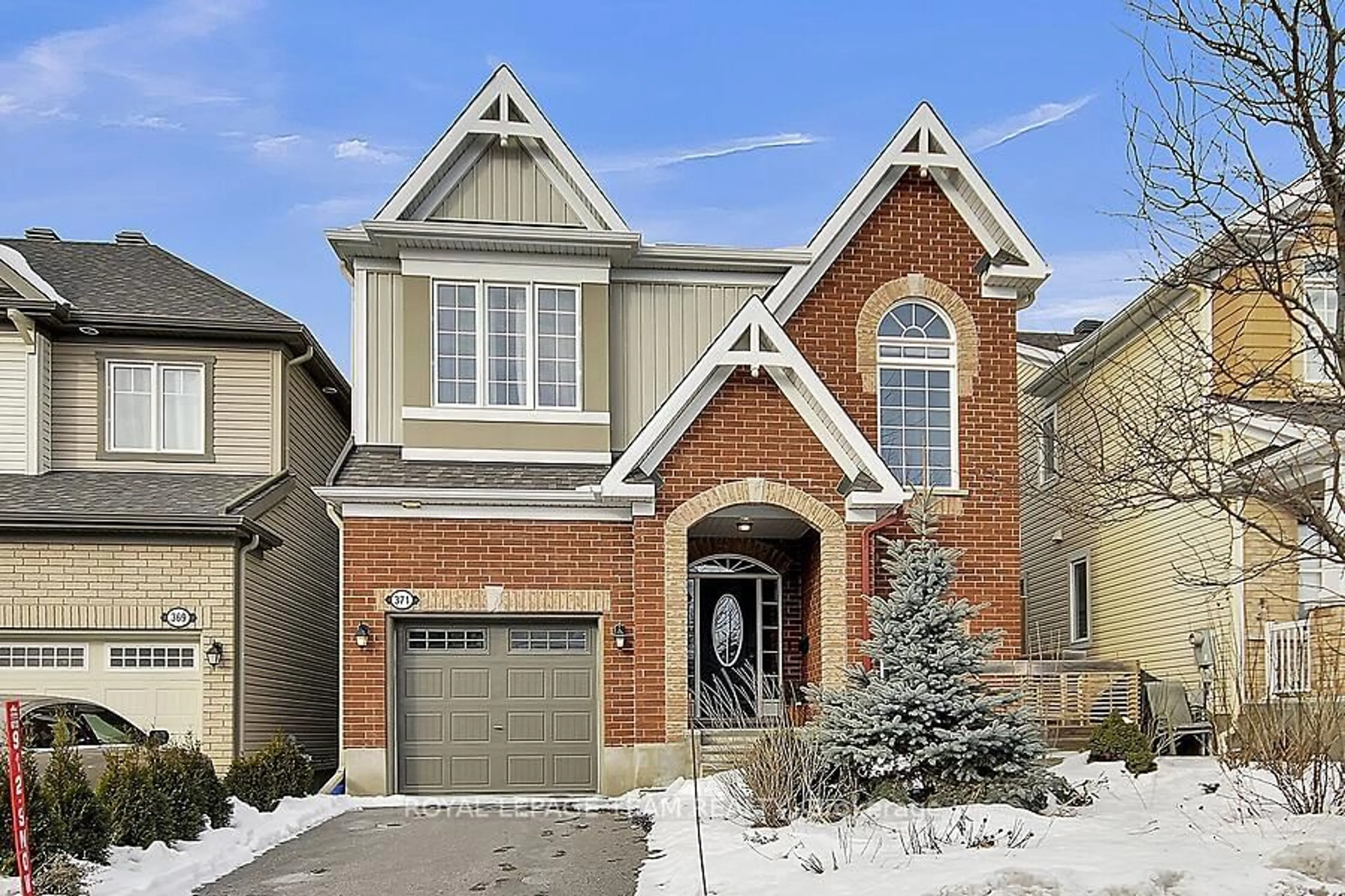 Home with brick exterior material, street for 371 Meadowbreeze Dr, Kanata Ontario K2M 0K3