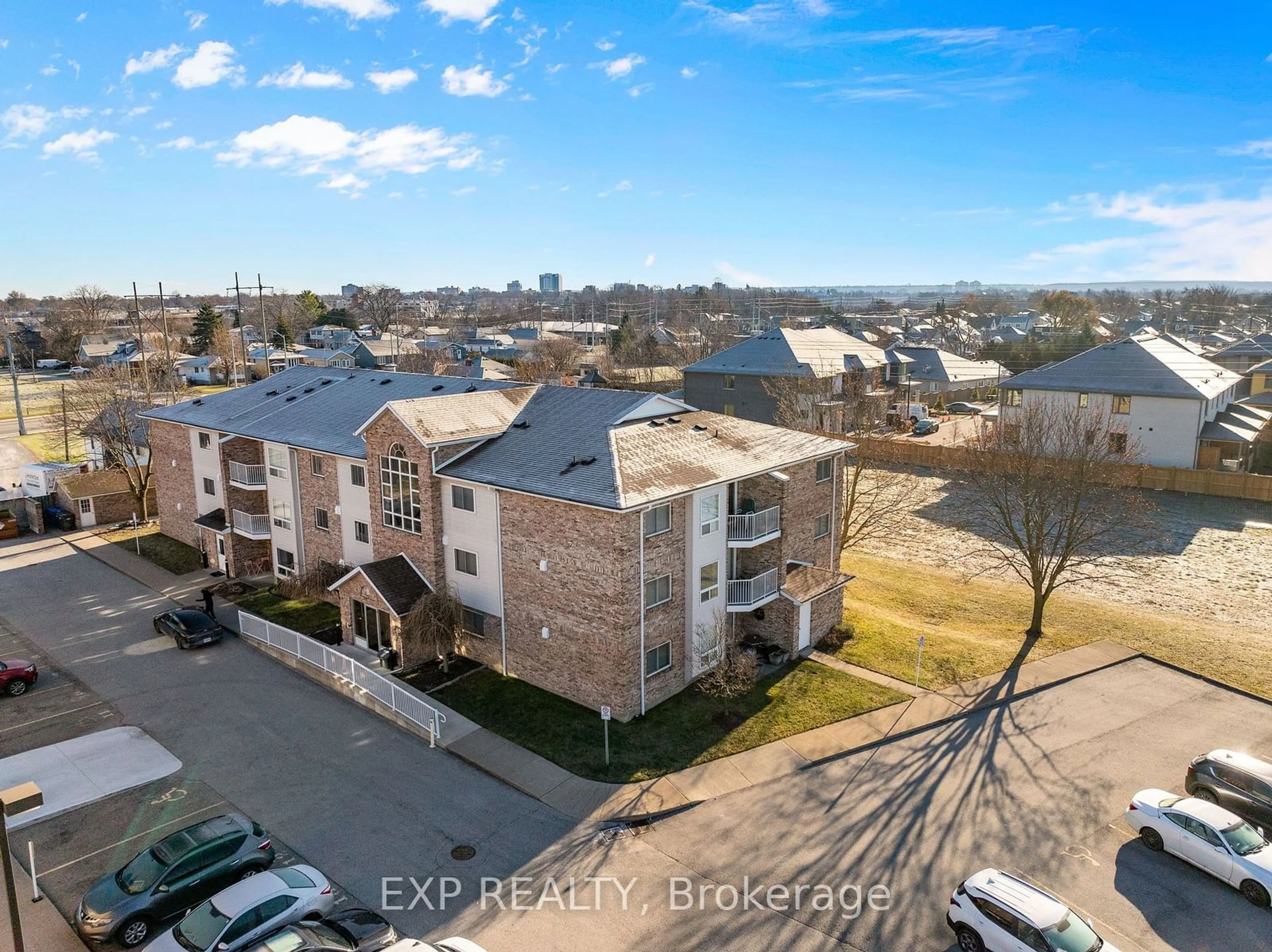 A pic from outside/outdoor area/front of a property/back of a property/a pic from drone, city buildings view from balcony for 1061 VANSICKLE Rd #306B, St. Catharines Ontario L2S 2X4