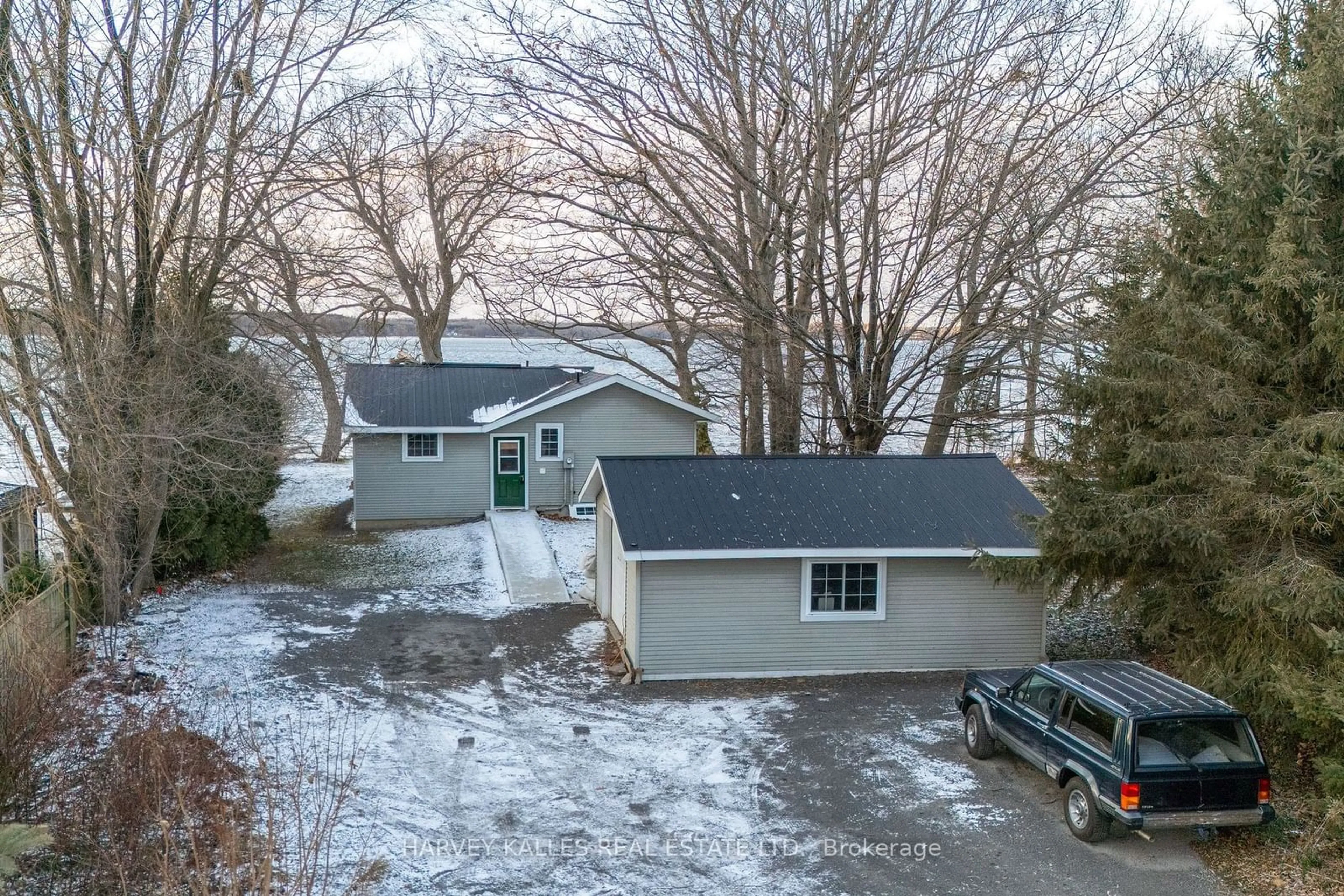 A pic from outside/outdoor area/front of a property/back of a property/a pic from drone, street for 2971 County Rd 13, Prince Edward County Ontario K0K 2T0