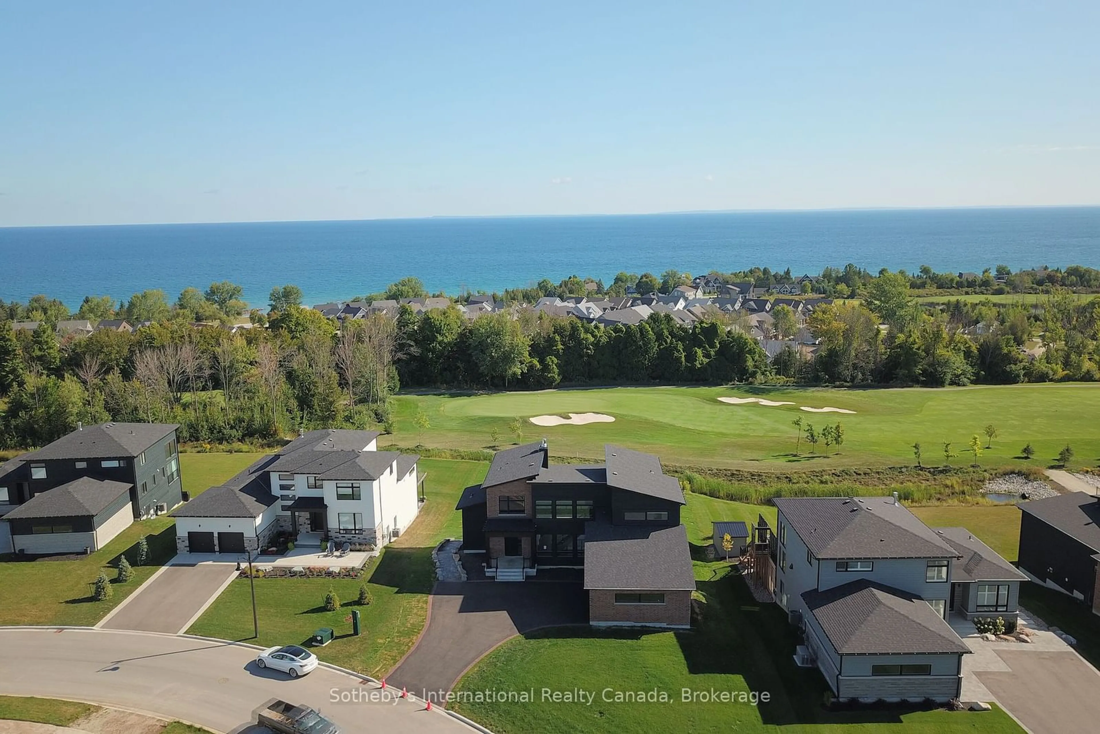 A pic from outside/outdoor area/front of a property/back of a property/a pic from drone, water/lake/river/ocean view for 101 Sladden Crt, Blue Mountains Ontario N0H 2P0