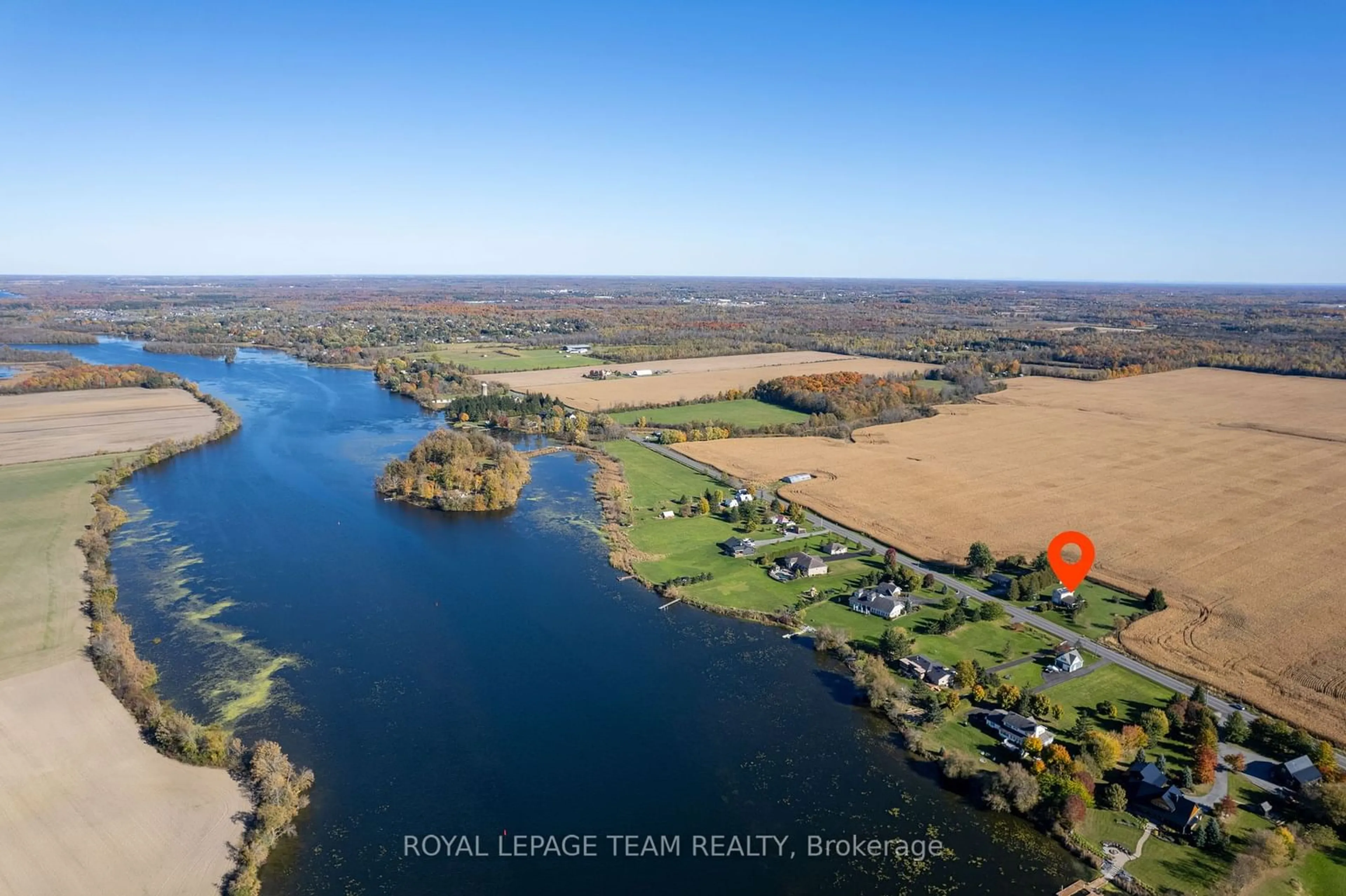 A pic from outside/outdoor area/front of a property/back of a property/a pic from drone, water/lake/river/ocean view for 1910 River Rd, North Grenville Ontario K0G 1J0