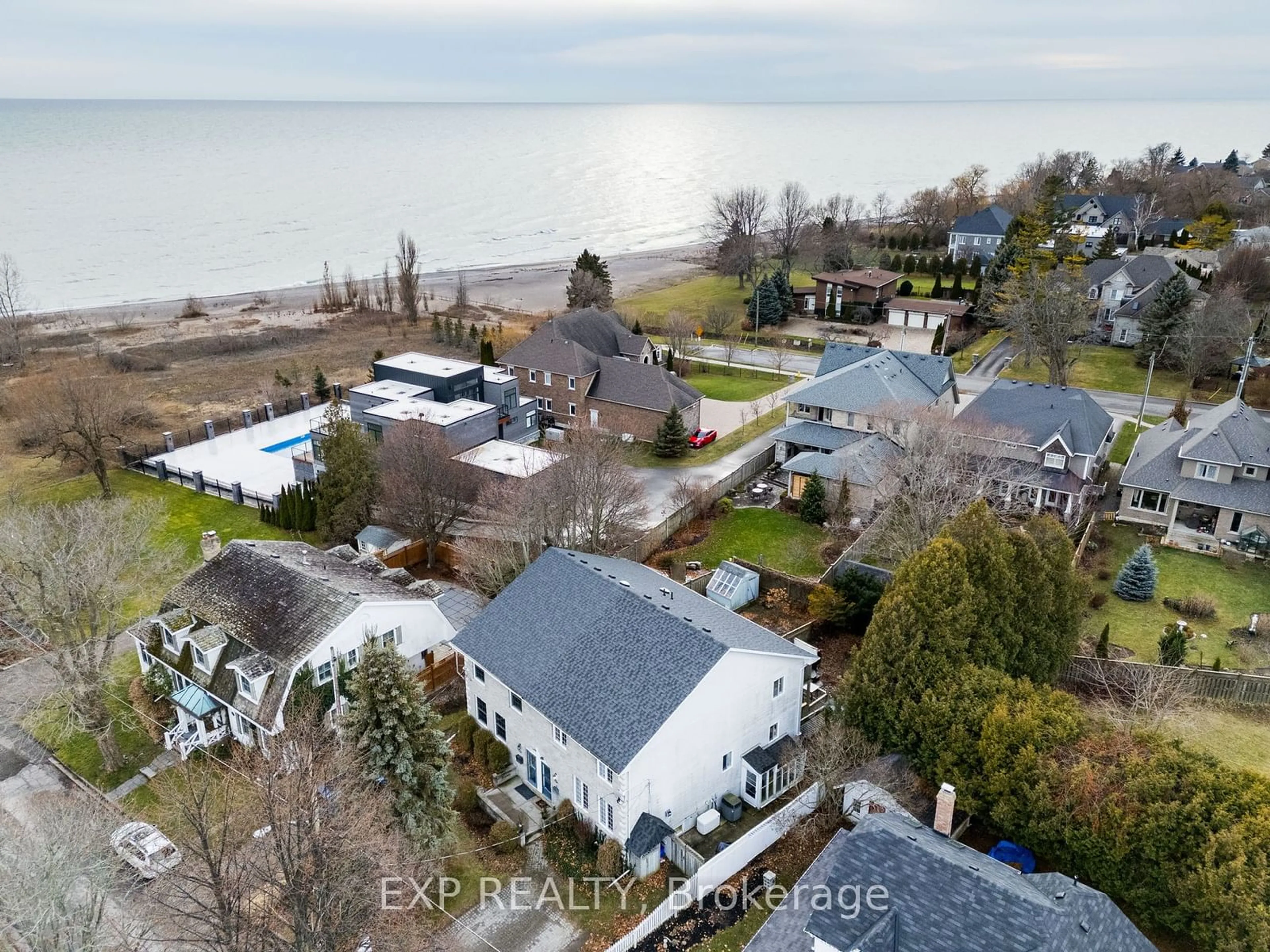 A pic from outside/outdoor area/front of a property/back of a property/a pic from drone, water/lake/river/ocean view for 101 Bagot St, Cobourg Ontario K9A 3E9