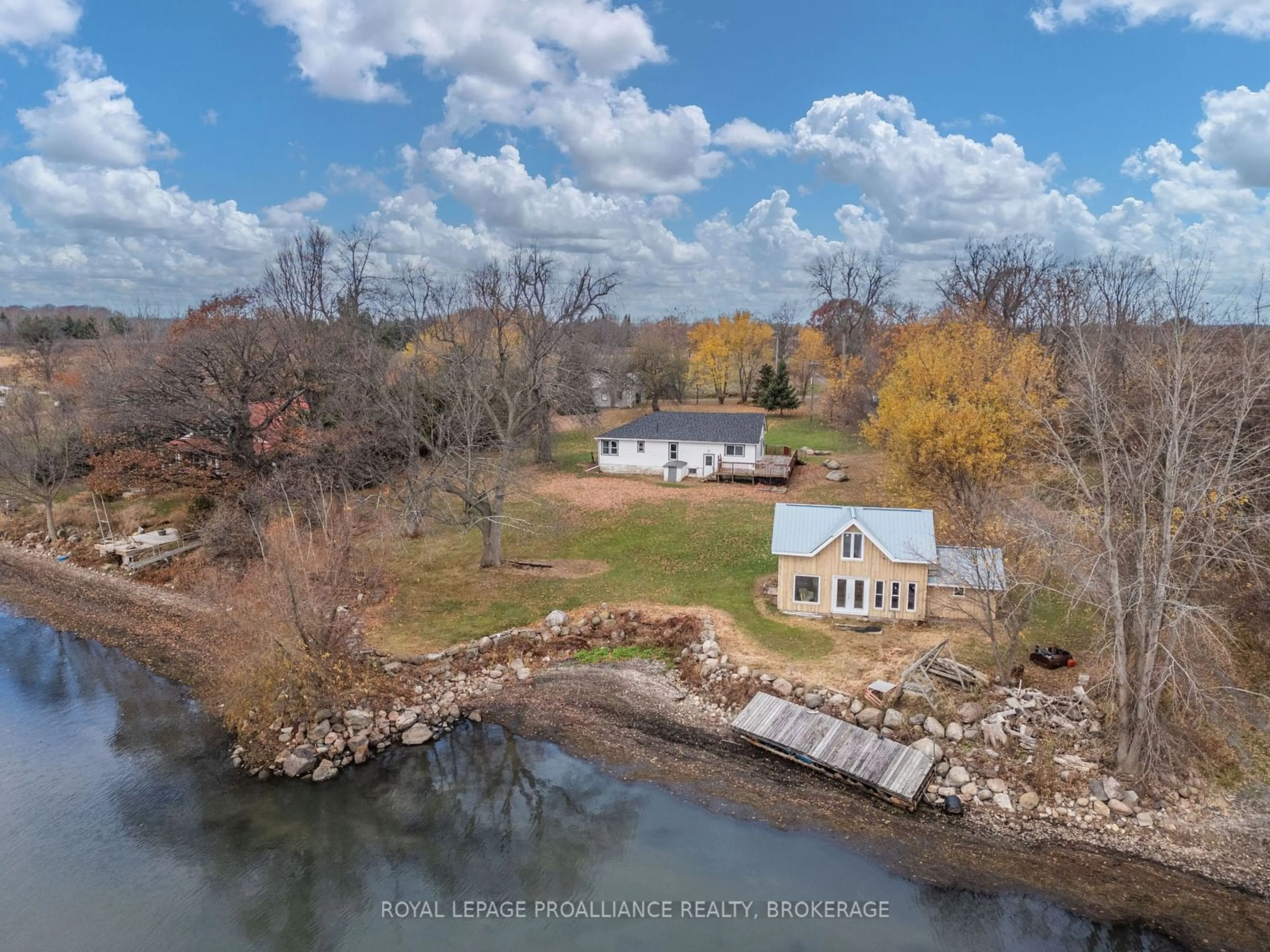 A pic from outside/outdoor area/front of a property/back of a property/a pic from drone, water/lake/river/ocean view for 217 Eleventh Line Rd, Frontenac Islands Ontario K0H 2Y0