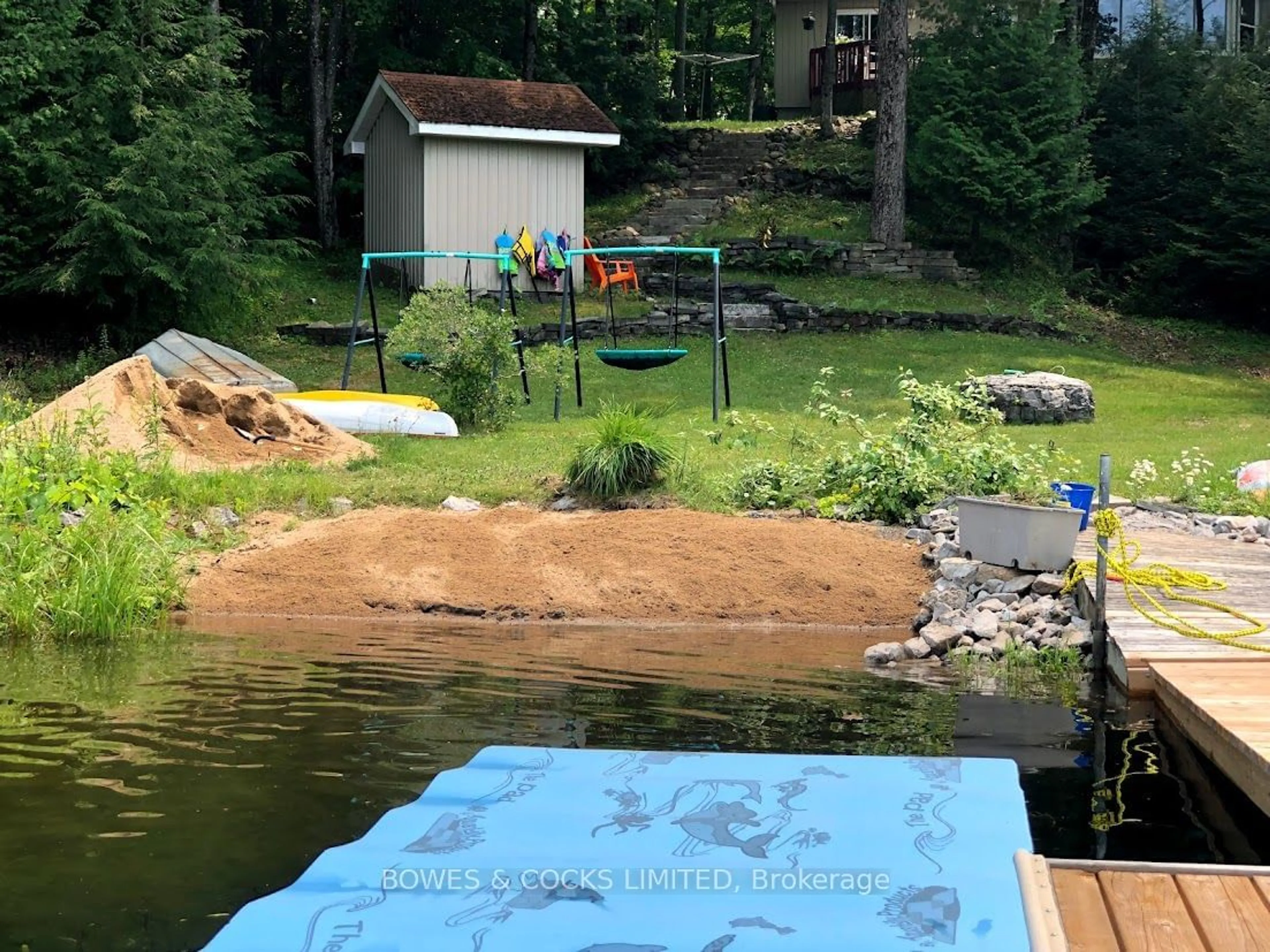 A pic from outside/outdoor area/front of a property/back of a property/a pic from drone, water/lake/river/ocean view for 233 Doc Evans Rd, North Kawartha Ontario K0L 1A0