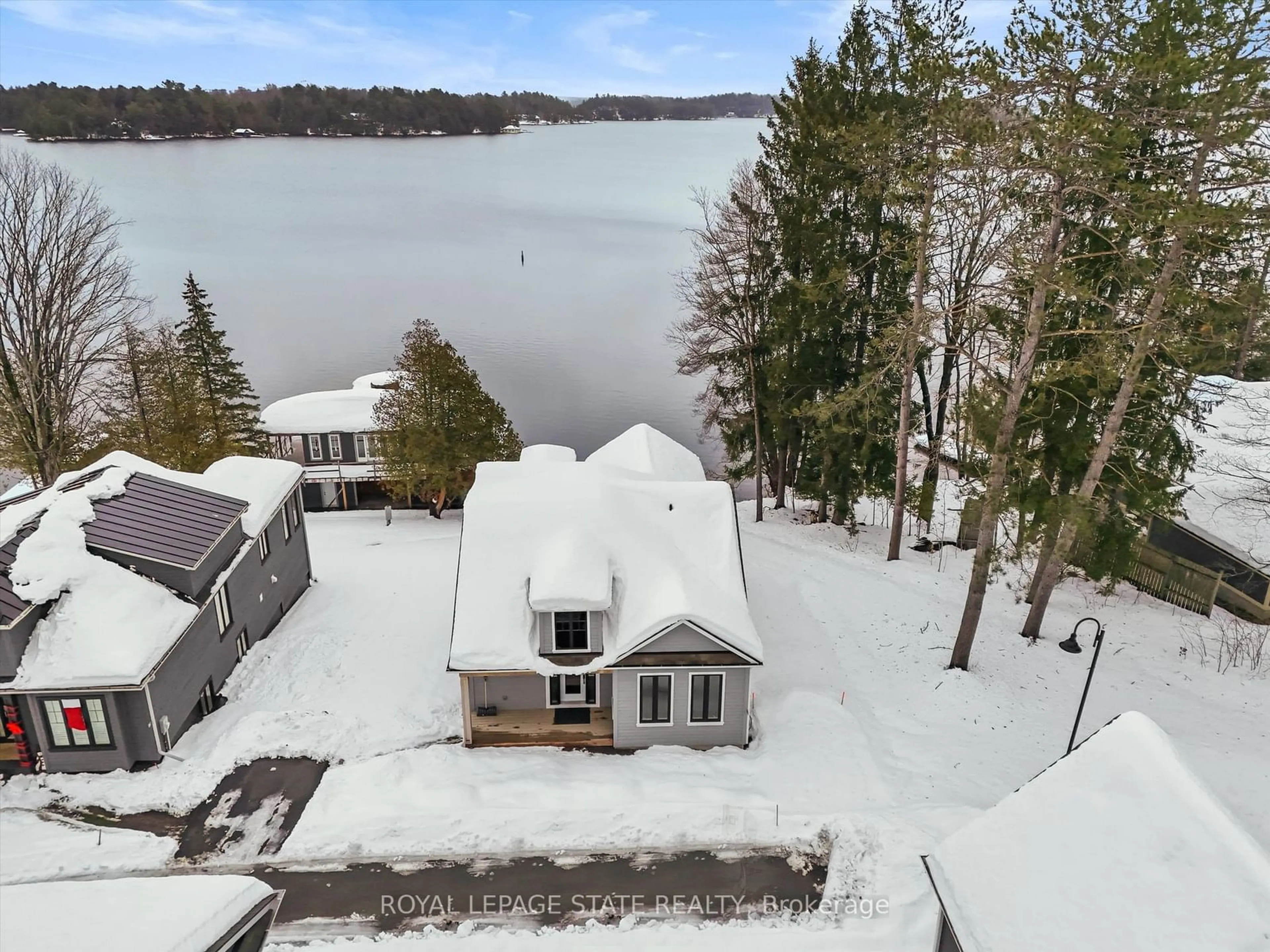 A pic from outside/outdoor area/front of a property/back of a property/a pic from drone, water/lake/river/ocean view for 2054 Peninsula Rd #37, Muskoka Lakes Ontario P0B 1G0