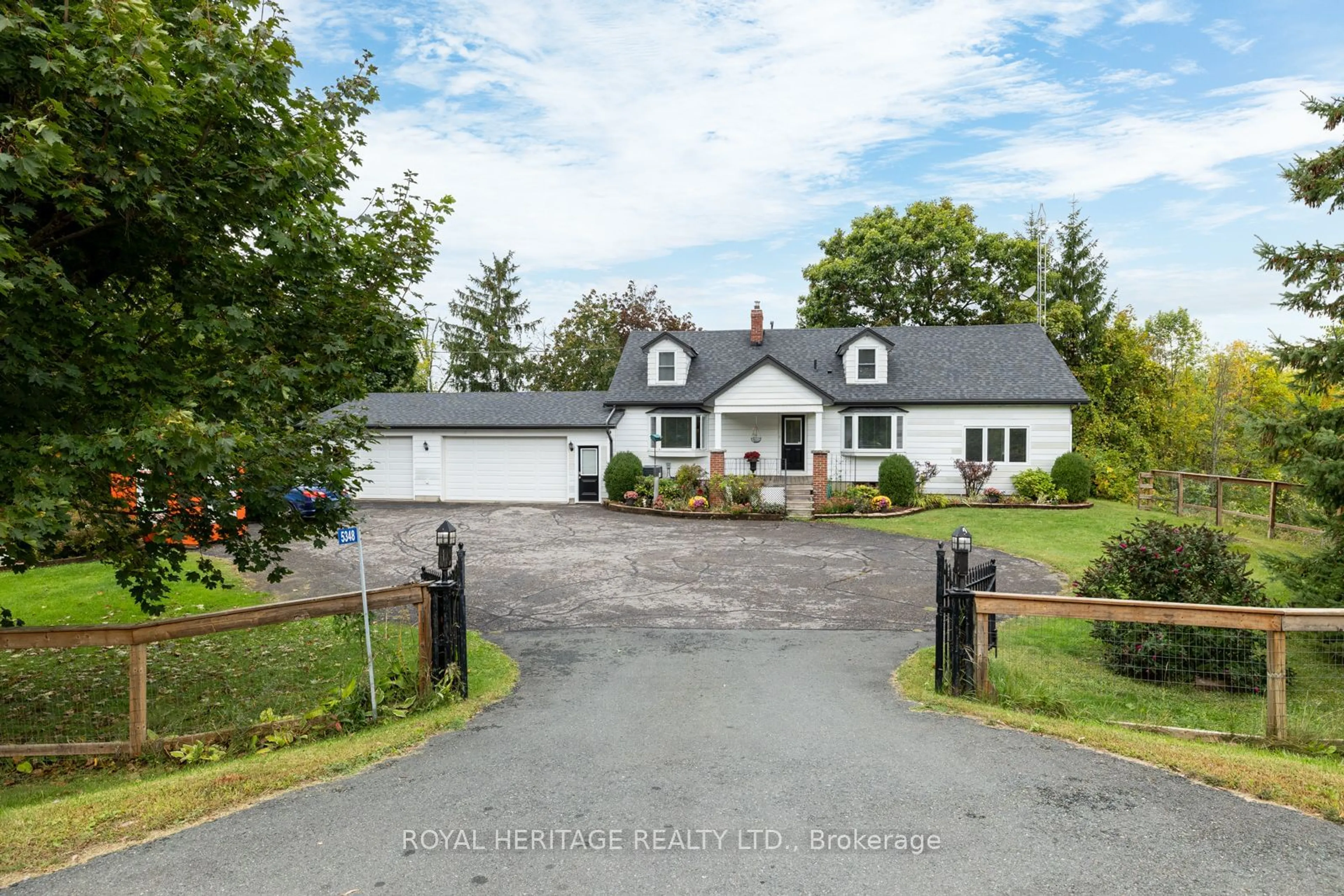 A pic from outside/outdoor area/front of a property/back of a property/a pic from drone, street for 5348 Rice Lake Scenic Dr, Hamilton Township Ontario K0K 2E0