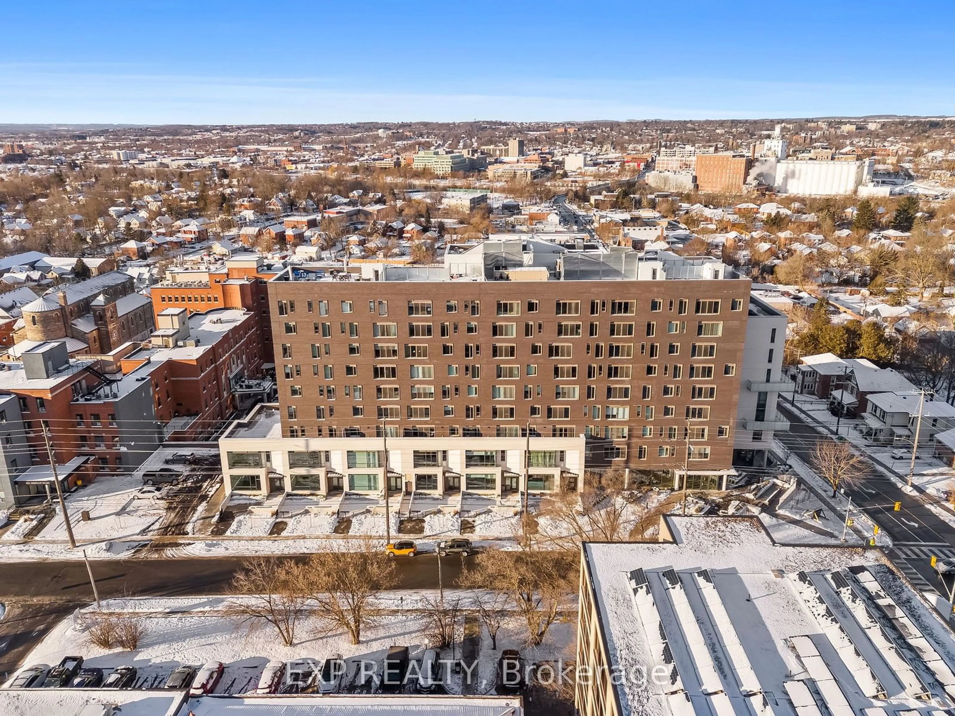 A pic from outside/outdoor area/front of a property/back of a property/a pic from drone, city buildings view from balcony for 195 Hunter St #401, Peterborough Ontario K9H 1G9