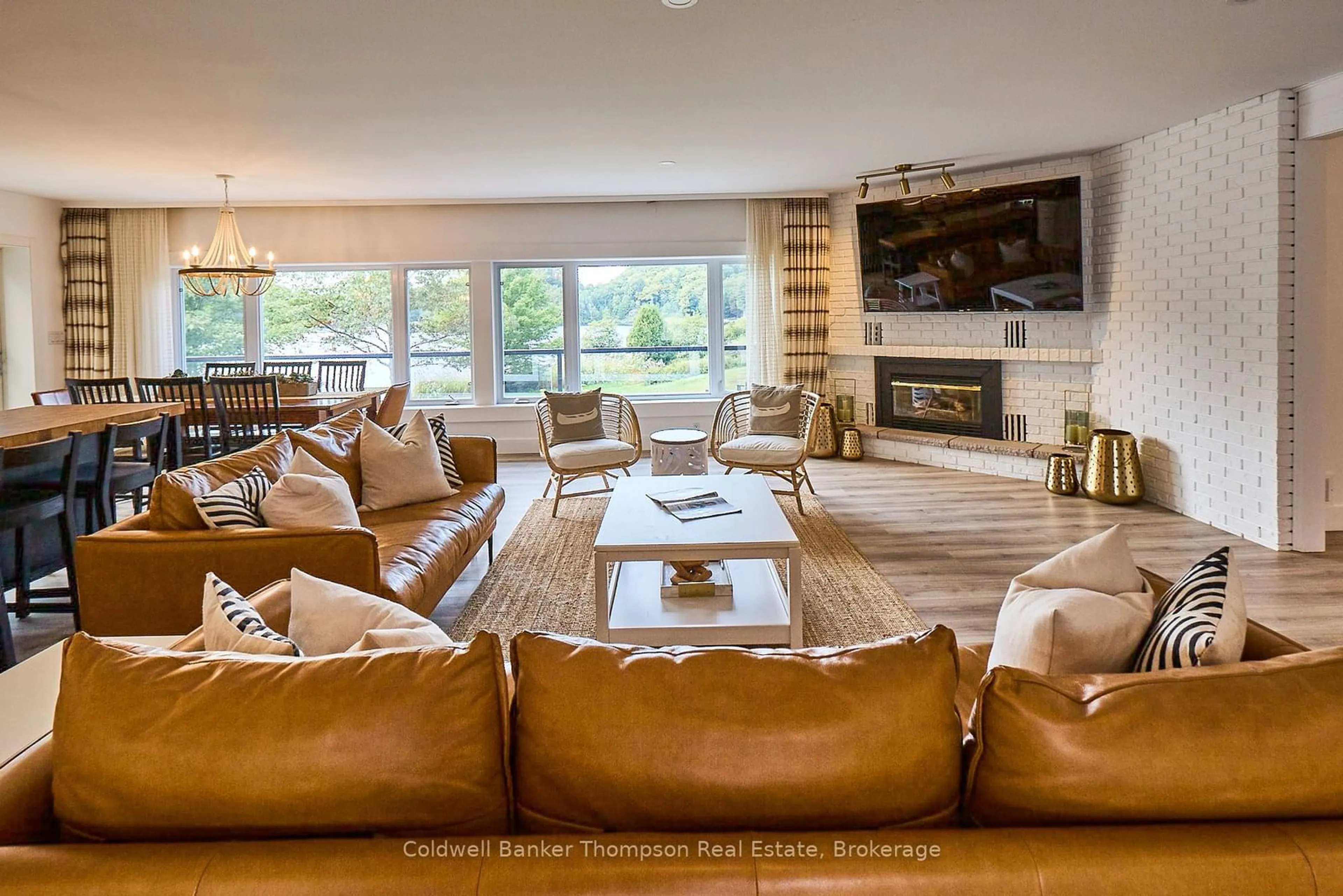 Living room with furniture, ceramic/tile floor for 32 Beach Rd, Huntsville Ontario P0B 1M0