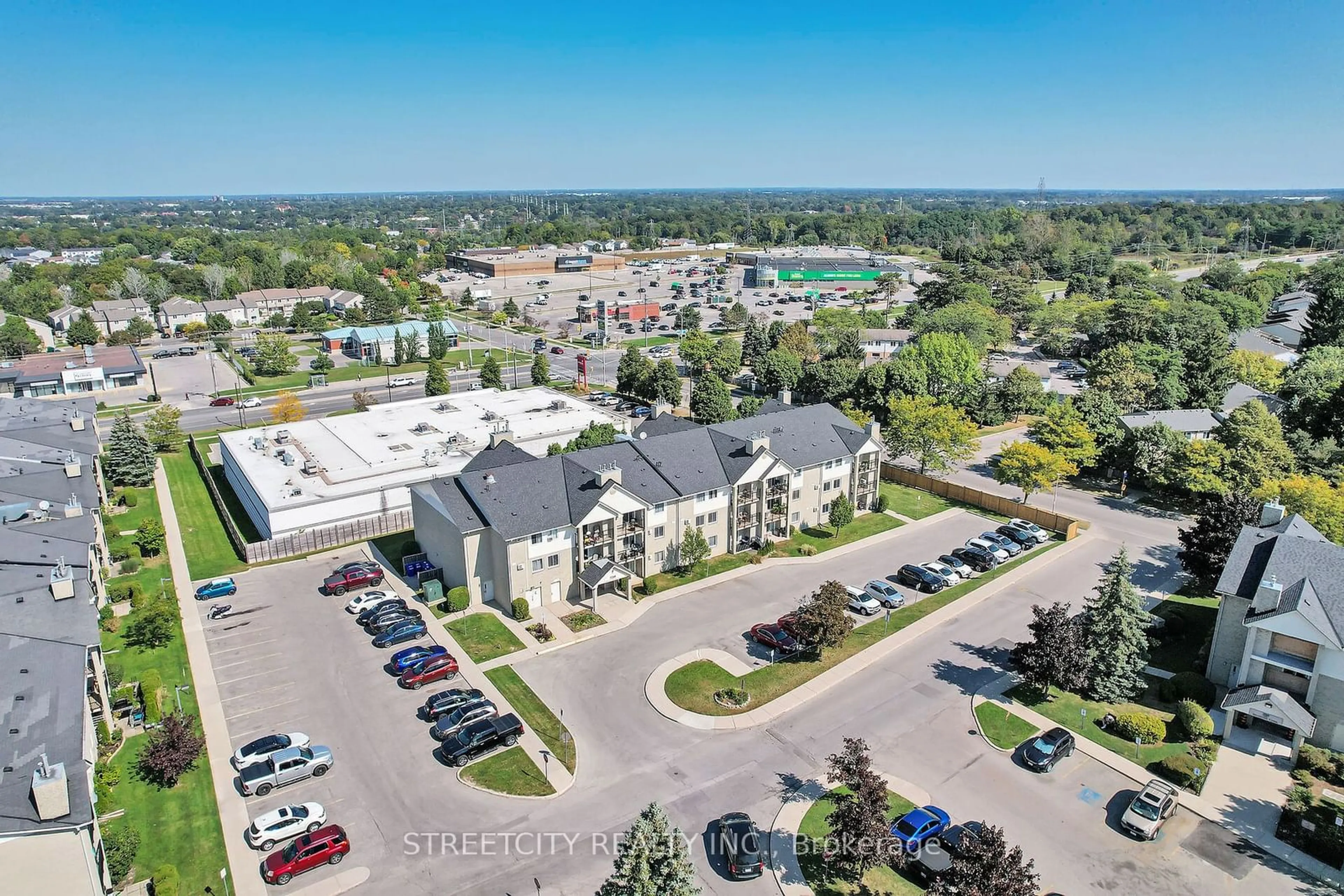 A pic from outside/outdoor area/front of a property/back of a property/a pic from drone, street for 739 Deveron Cres #209, London Ontario N5Z 4Y1