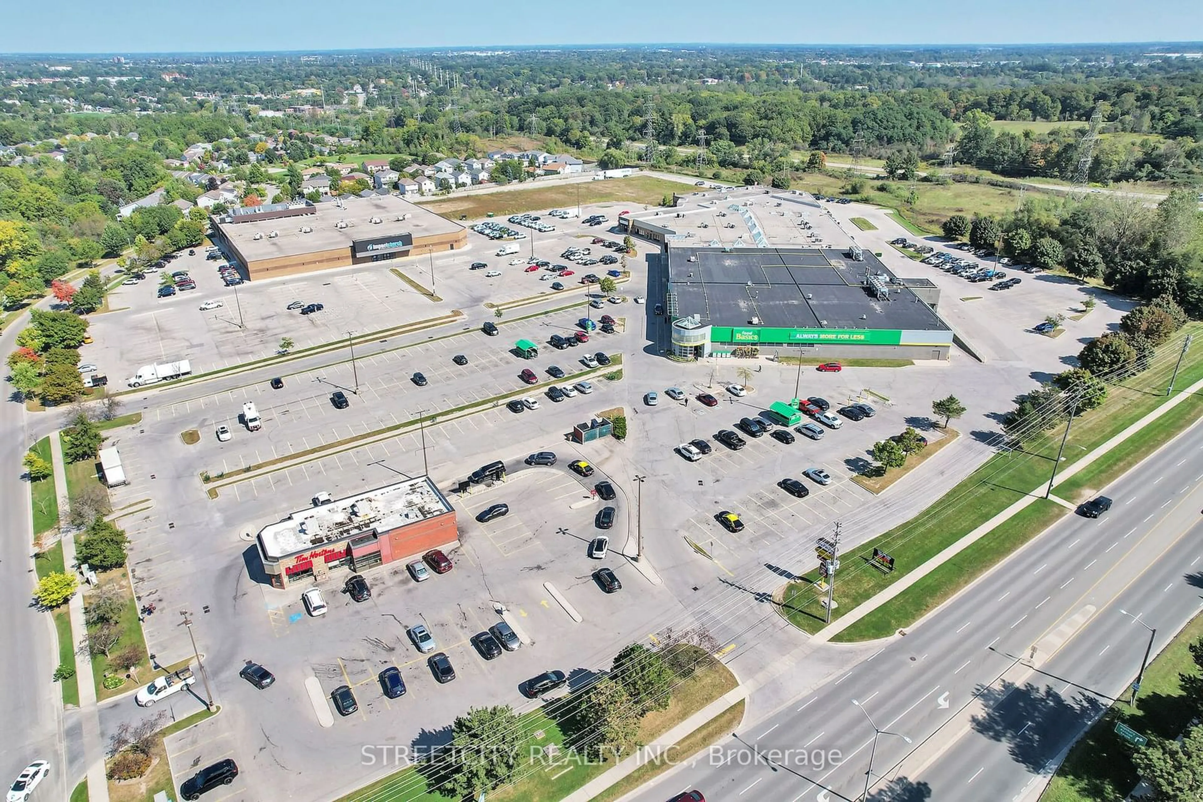 A pic from outside/outdoor area/front of a property/back of a property/a pic from drone, street for 739 Deveron Cres #209, London Ontario N5Z 4Y1