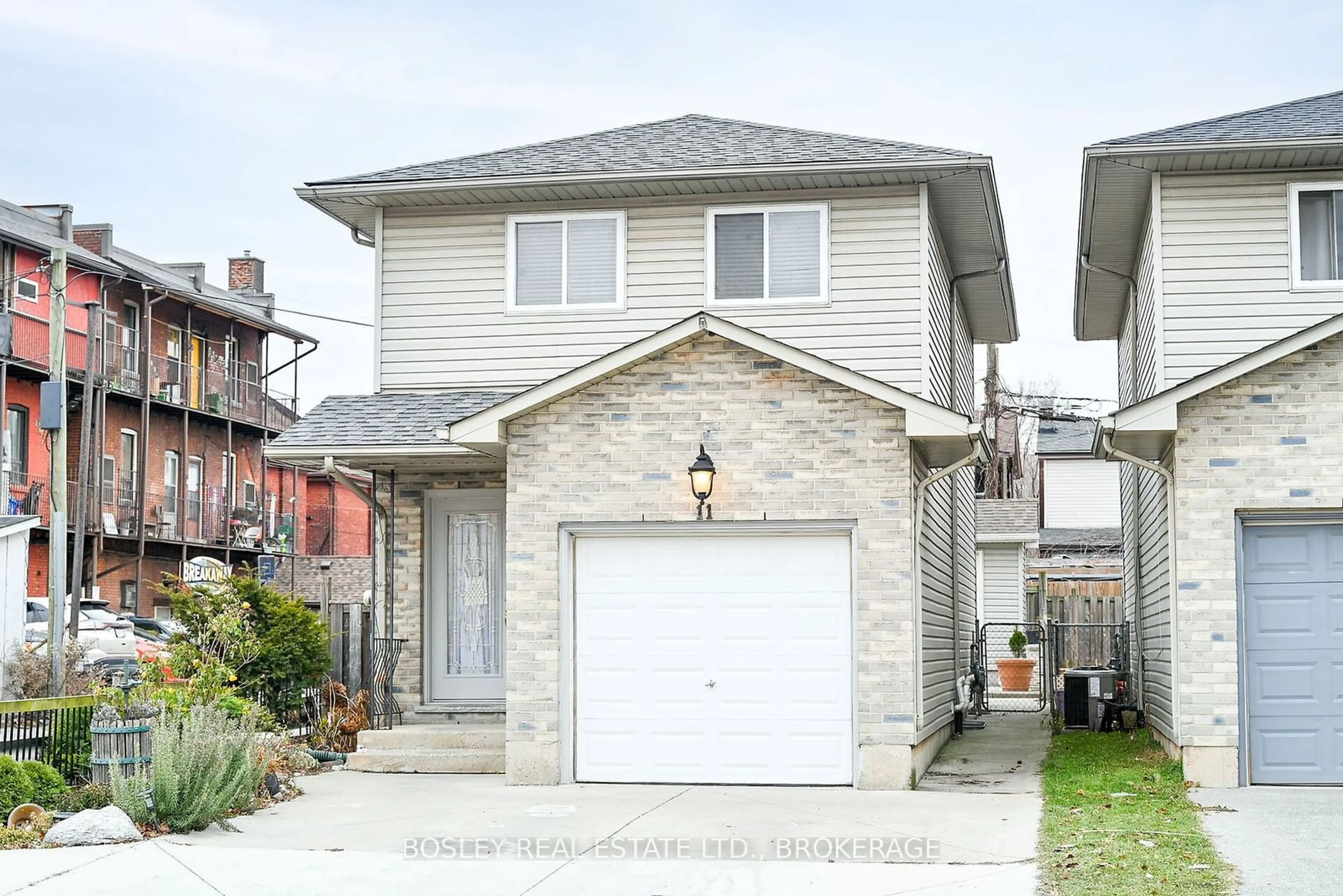 Home with vinyl exterior material, street for 11 Cheever St, Hamilton Ontario L8L 5R6