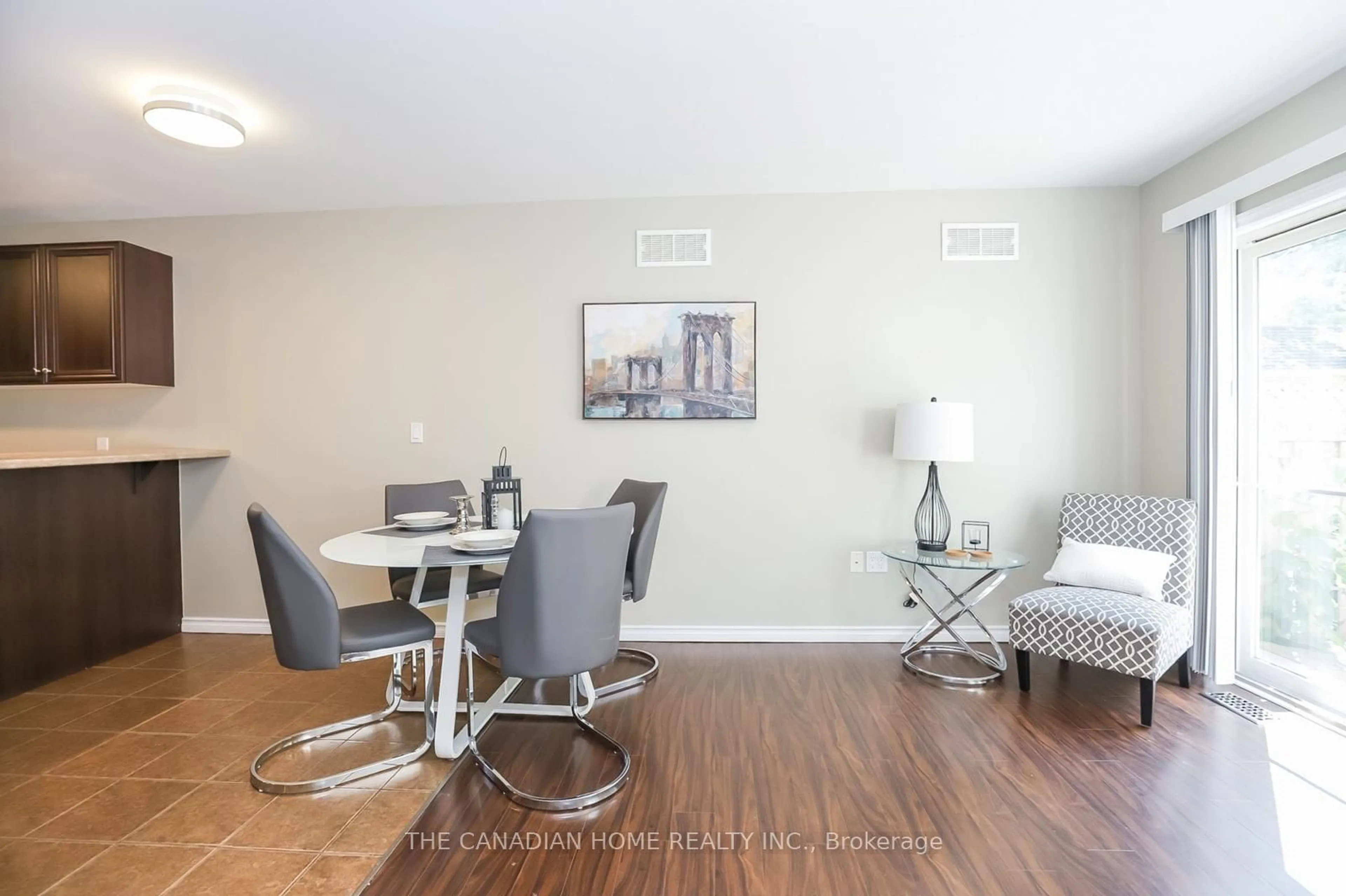 Dining room, wood/laminate floor for 4993 St. Clair Ave, Niagara Falls Ontario L2E 3T8