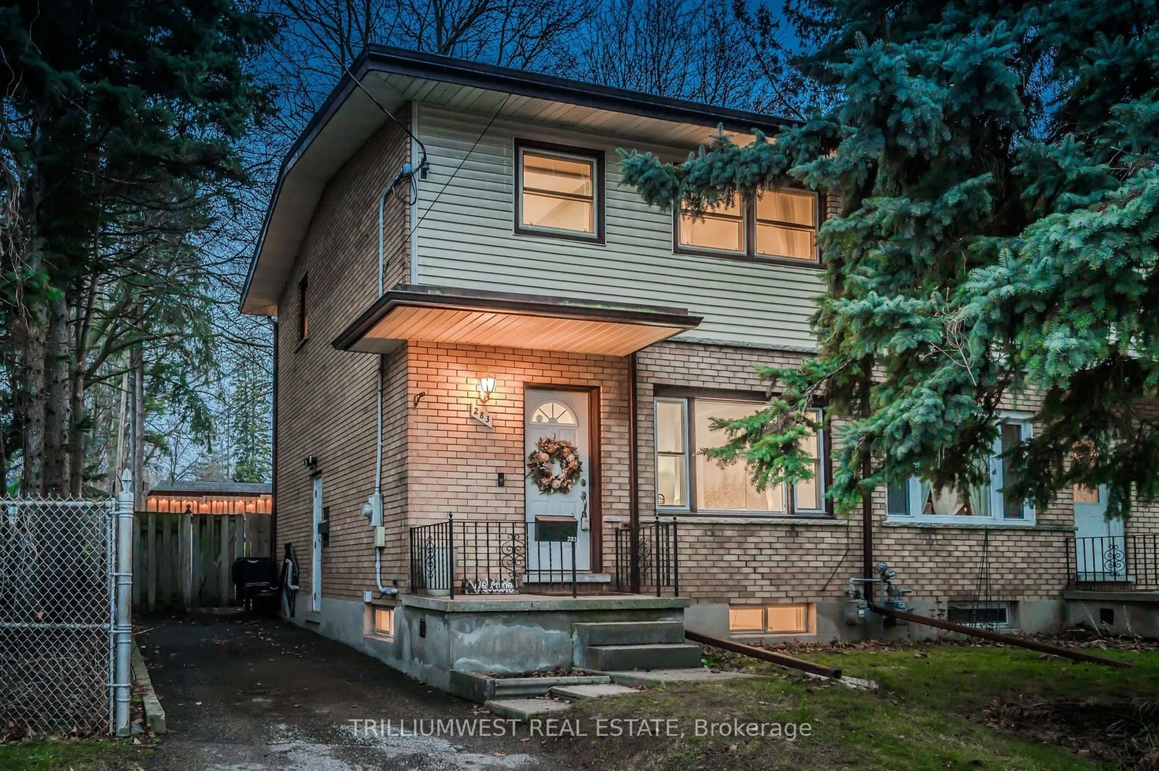 Home with brick exterior material, street for 283 Spadina Rd, Kitchener Ontario N2M 3X9