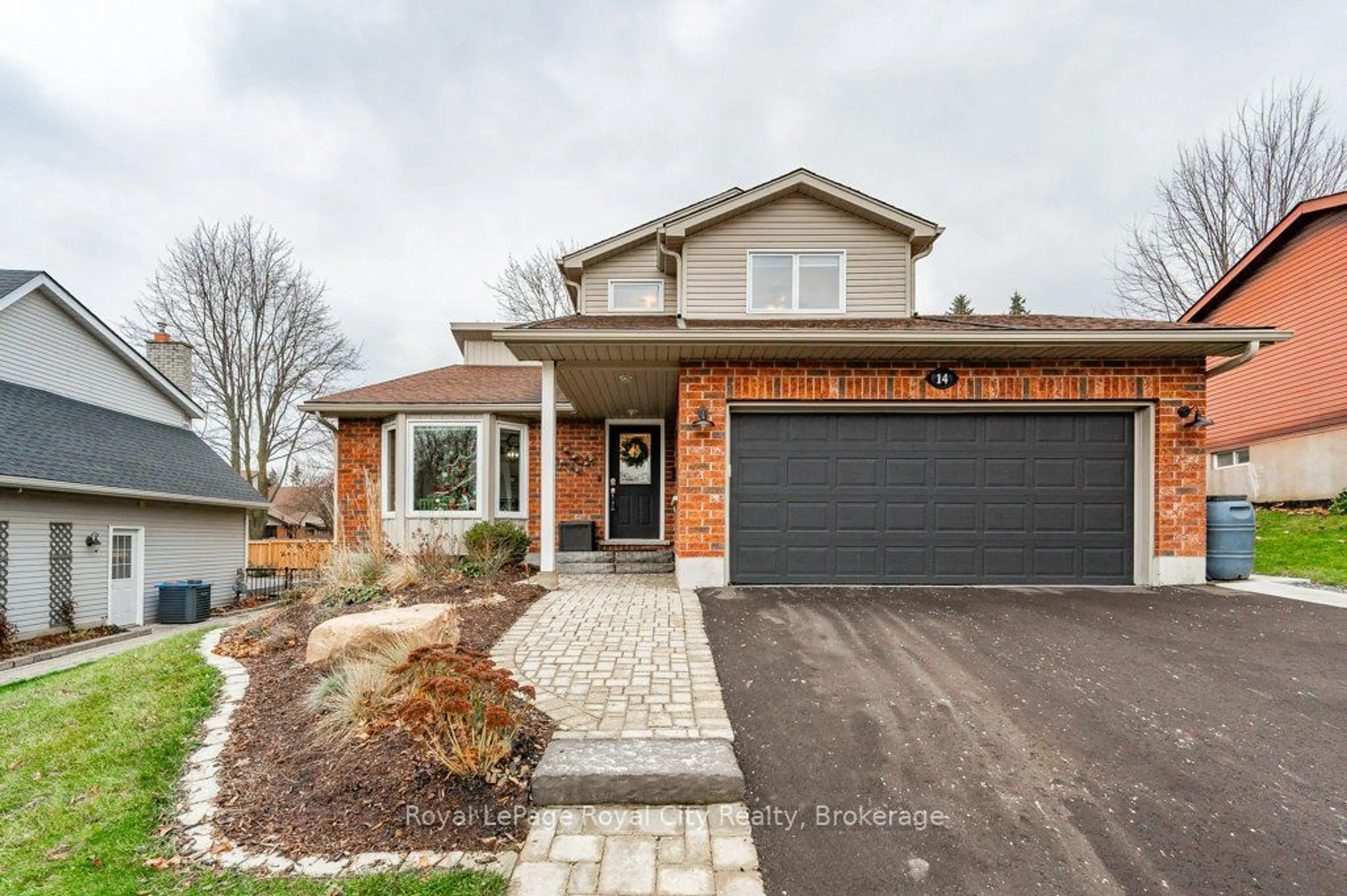 Home with brick exterior material, street for 14 Primrose Lane, Guelph Ontario N1H 7V4