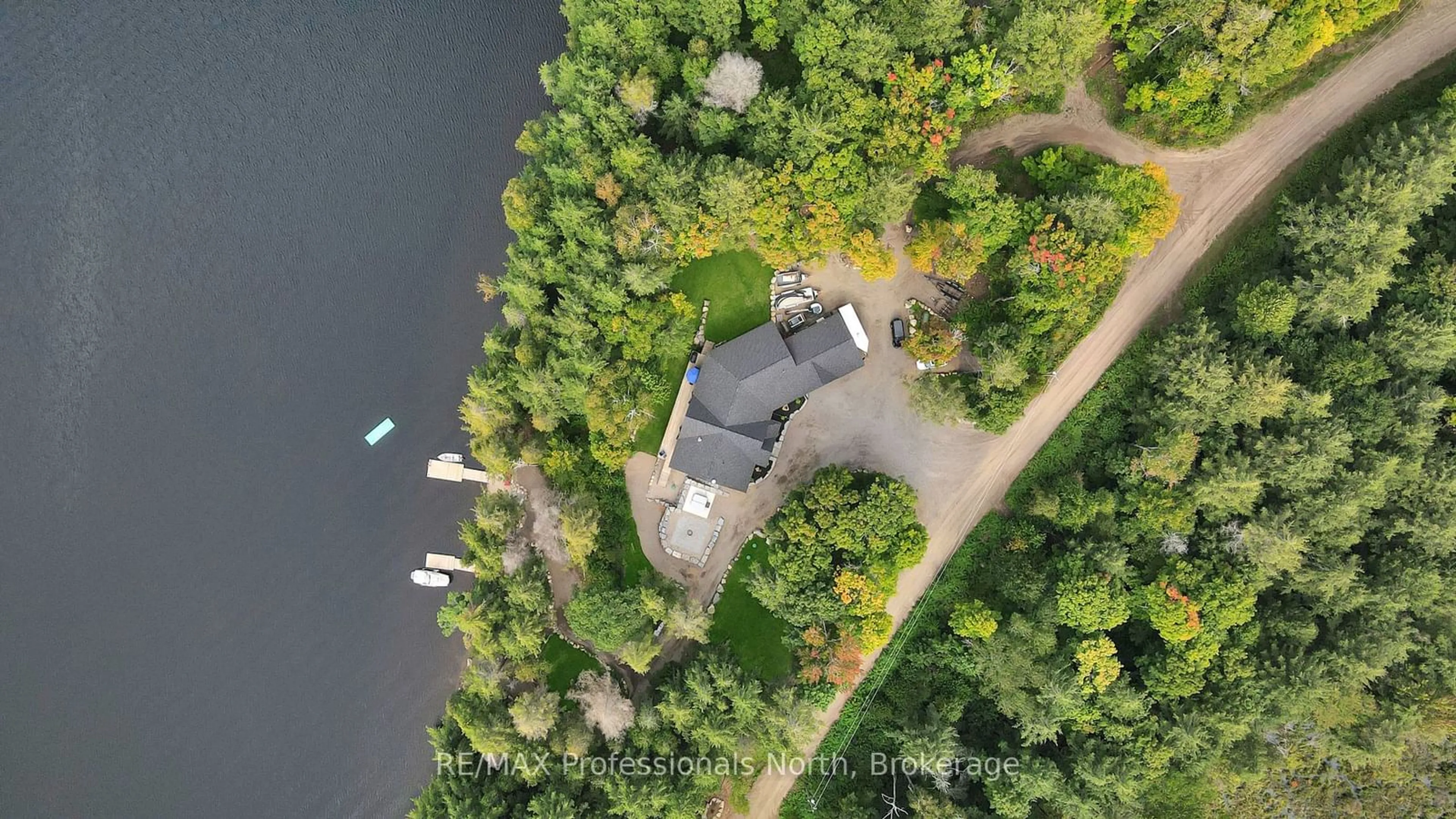 A pic from outside/outdoor area/front of a property/back of a property/a pic from drone, water/lake/river/ocean view for 1034 Lone Wolf Cres, Dysart et al Ontario K0M 1S0