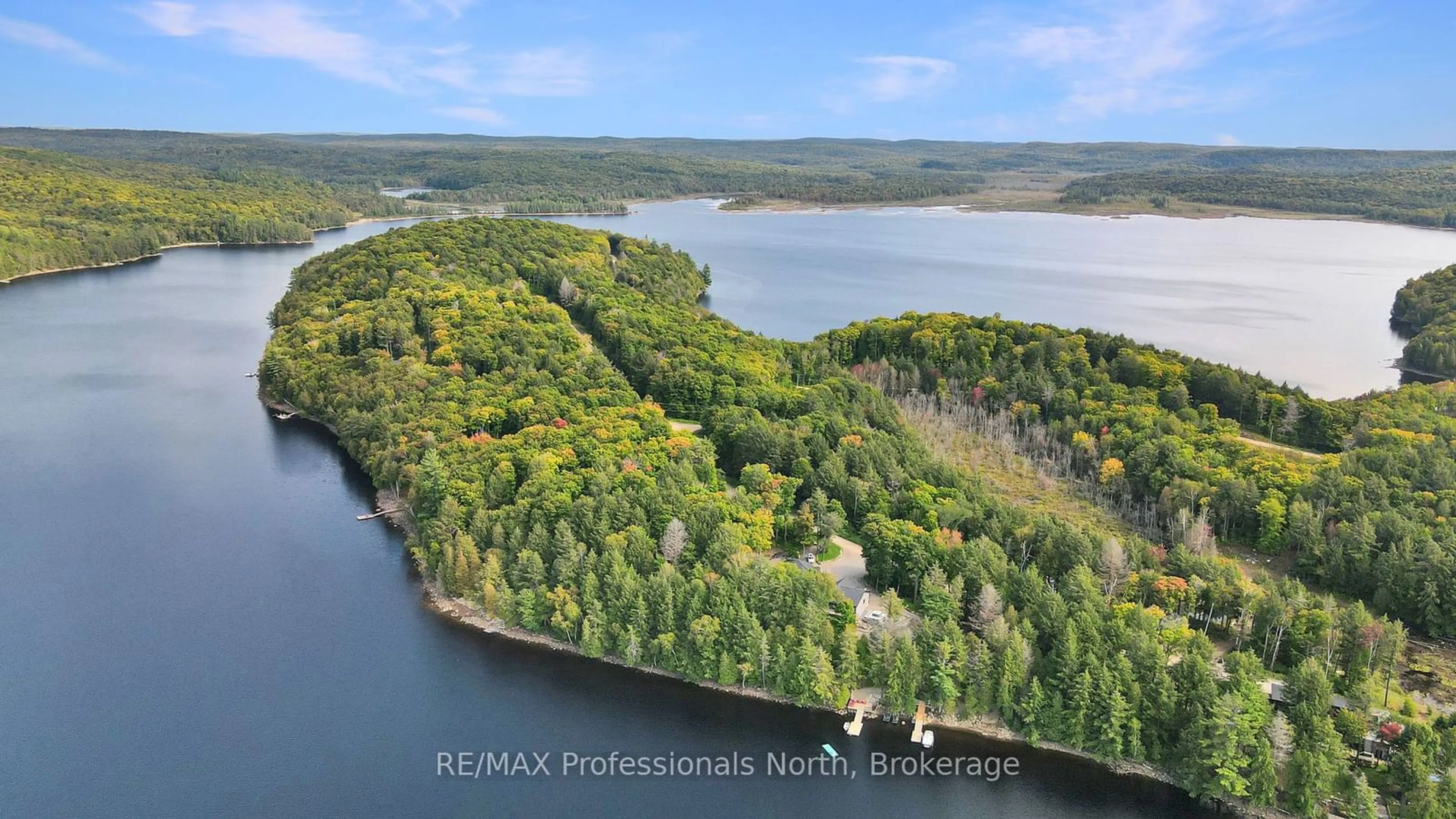 A pic from outside/outdoor area/front of a property/back of a property/a pic from drone, water/lake/river/ocean view for 1034 Lone Wolf Cres, Dysart et al Ontario K0M 1S0