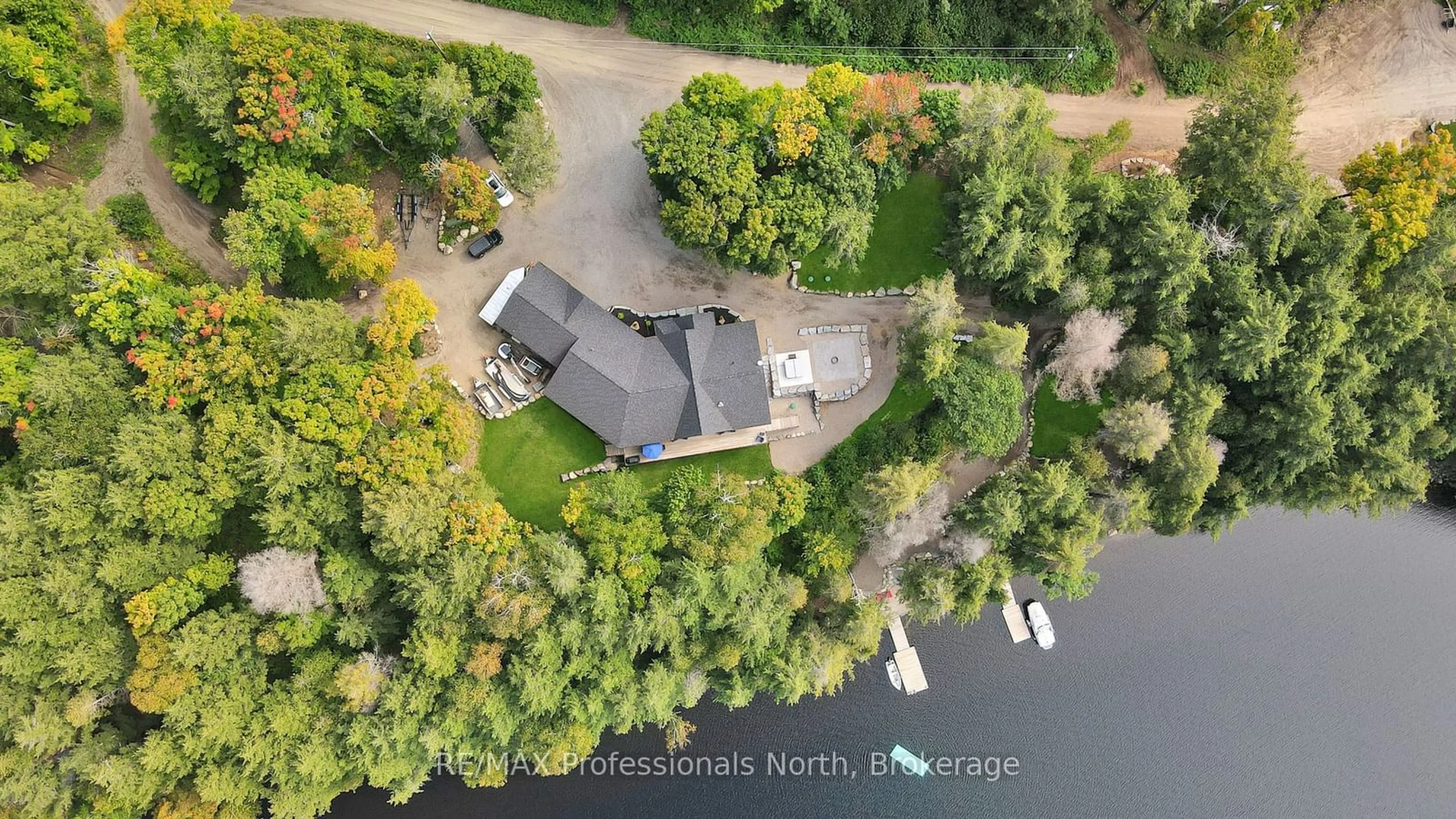 A pic from outside/outdoor area/front of a property/back of a property/a pic from drone, water/lake/river/ocean view for 1034 Lone Wolf Cres, Dysart et al Ontario K0M 1S0