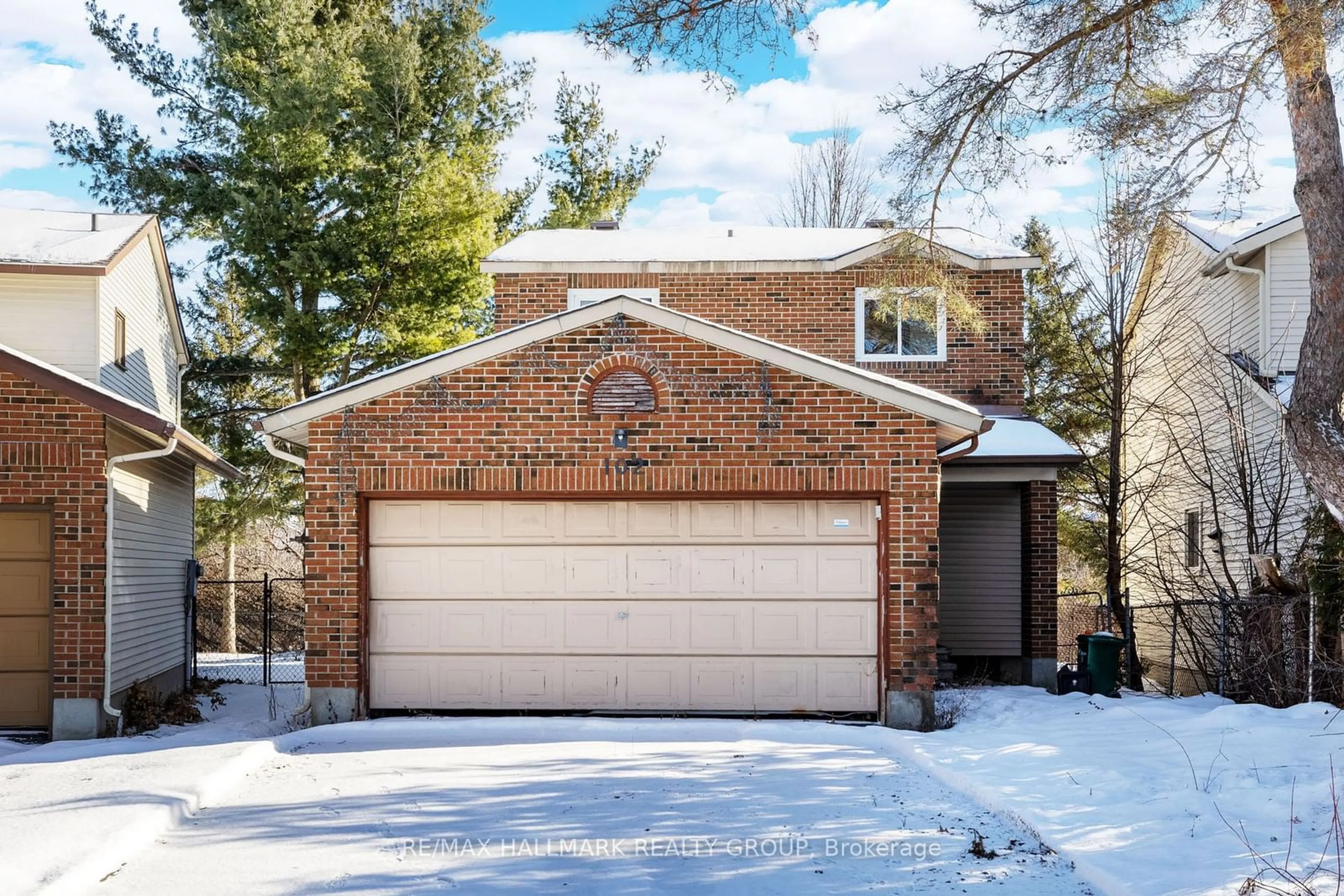 Home with brick exterior material, street for 102 Coolspring Cres, Cityview - Parkwoods Hills - Rideau Shore Ontario K2E 7M8