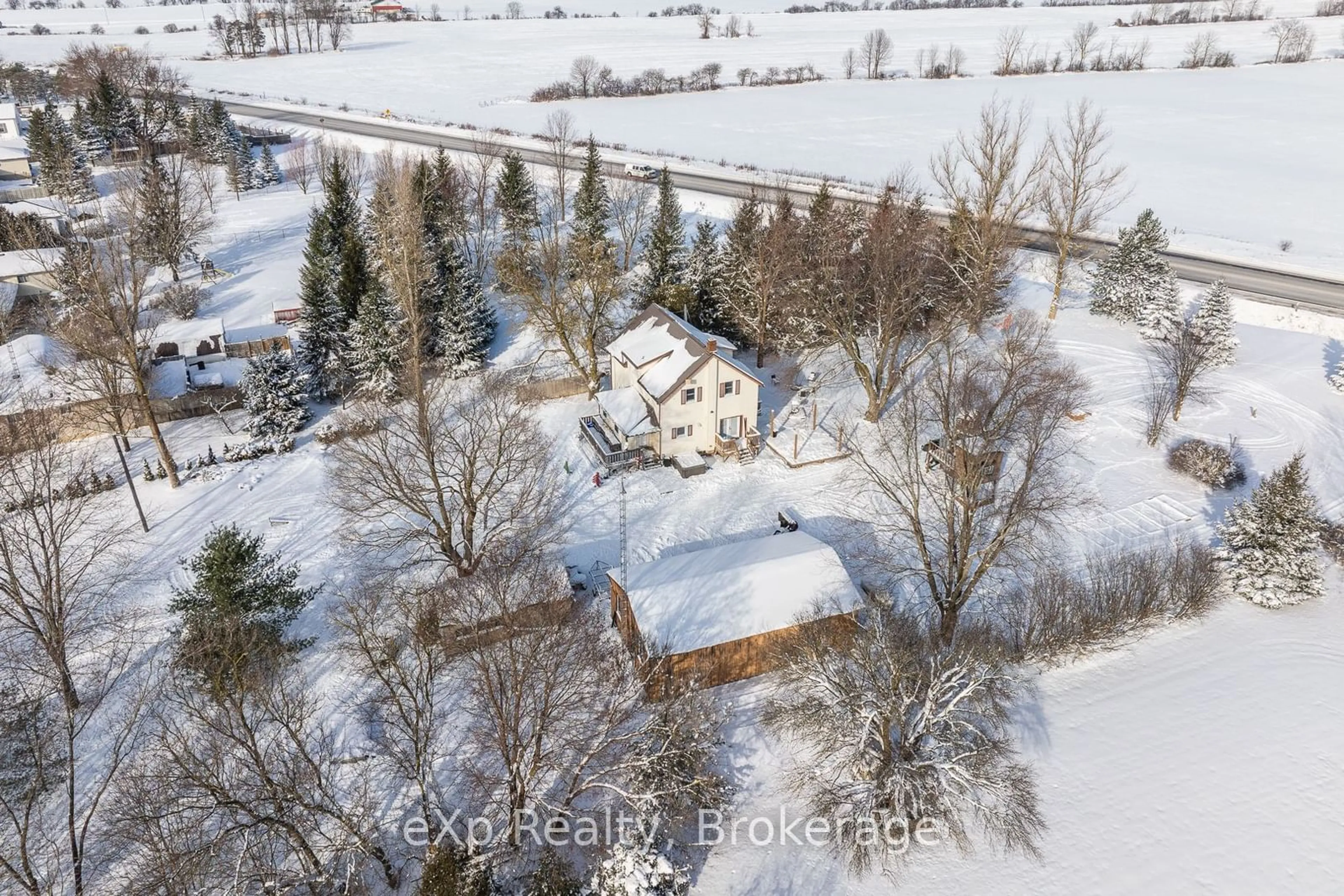 A pic from outside/outdoor area/front of a property/back of a property/a pic from drone, street for 9499 Maas Park Dr, Wellington North Ontario N0G 2L0