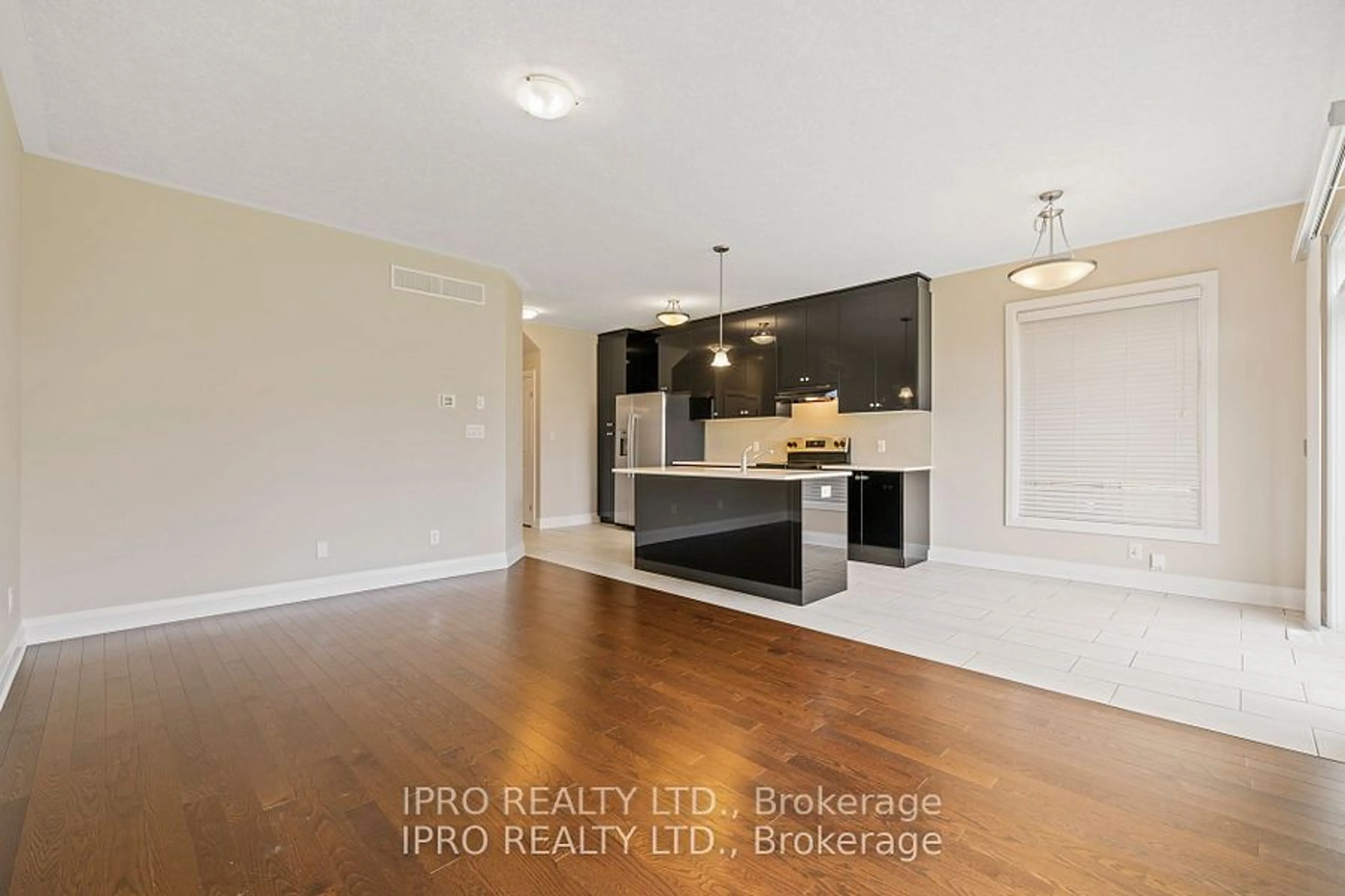 Open concept kitchen, wood/laminate floor for 208 Woodbine Ave, Kitchener Ontario N2R 1Y5