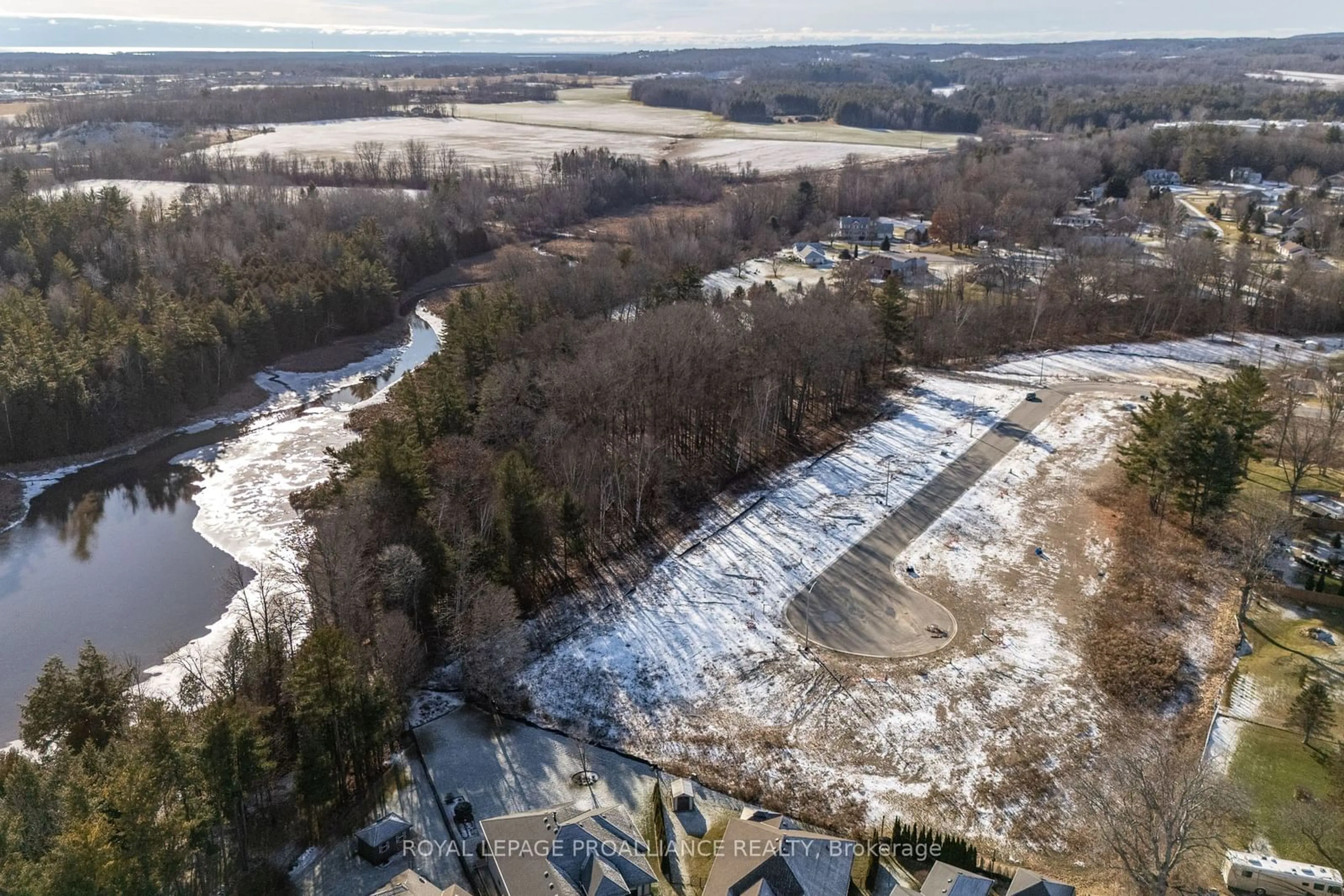 A pic from outside/outdoor area/front of a property/back of a property/a pic from drone, water/lake/river/ocean view for 36 Exeter Crt, Quinte West Ontario K8V 5P4