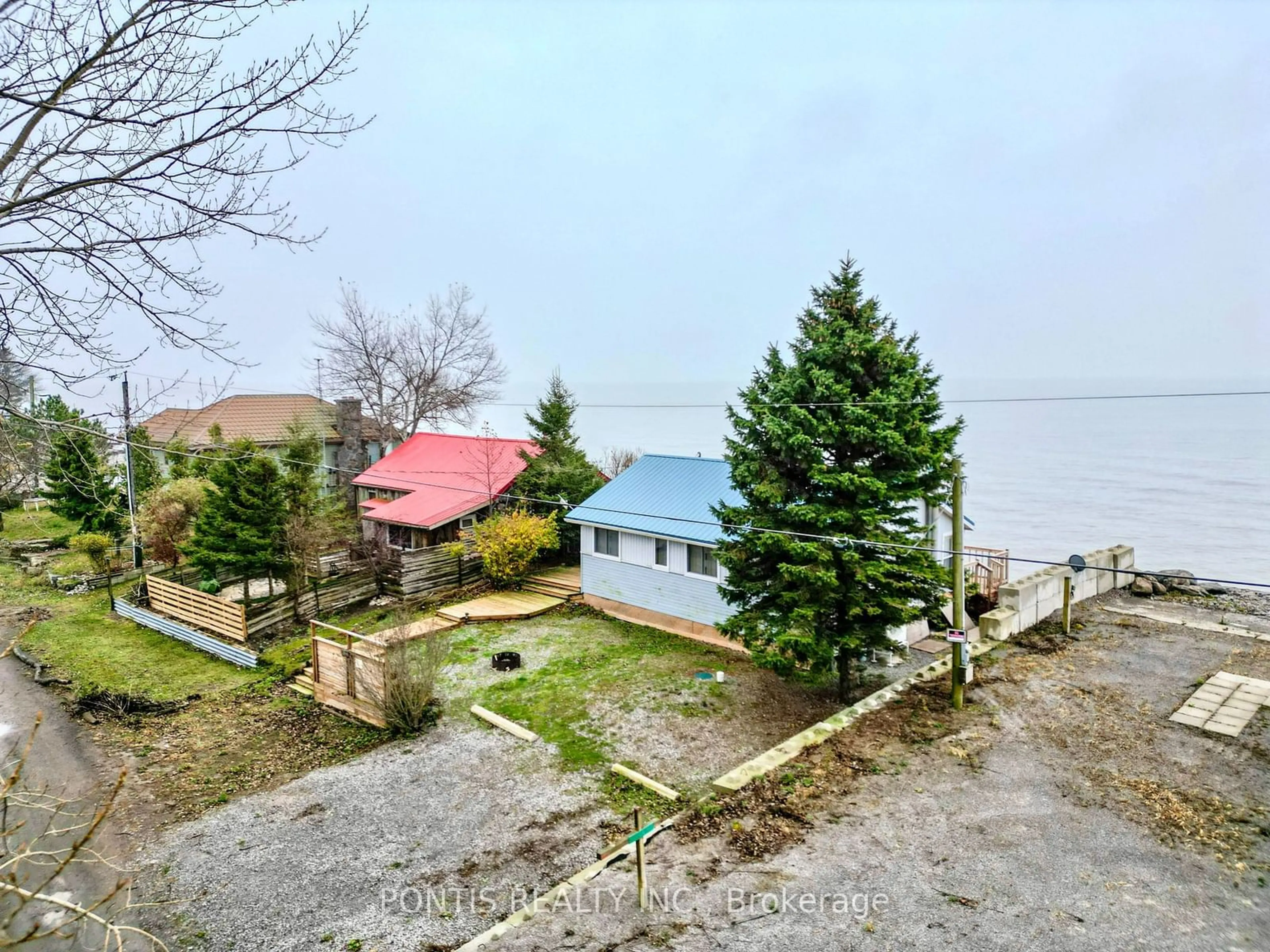 A pic from outside/outdoor area/front of a property/back of a property/a pic from drone, water/lake/river/ocean view for 235 Hastings Dr #235, Norfolk Ontario N0E 1M0