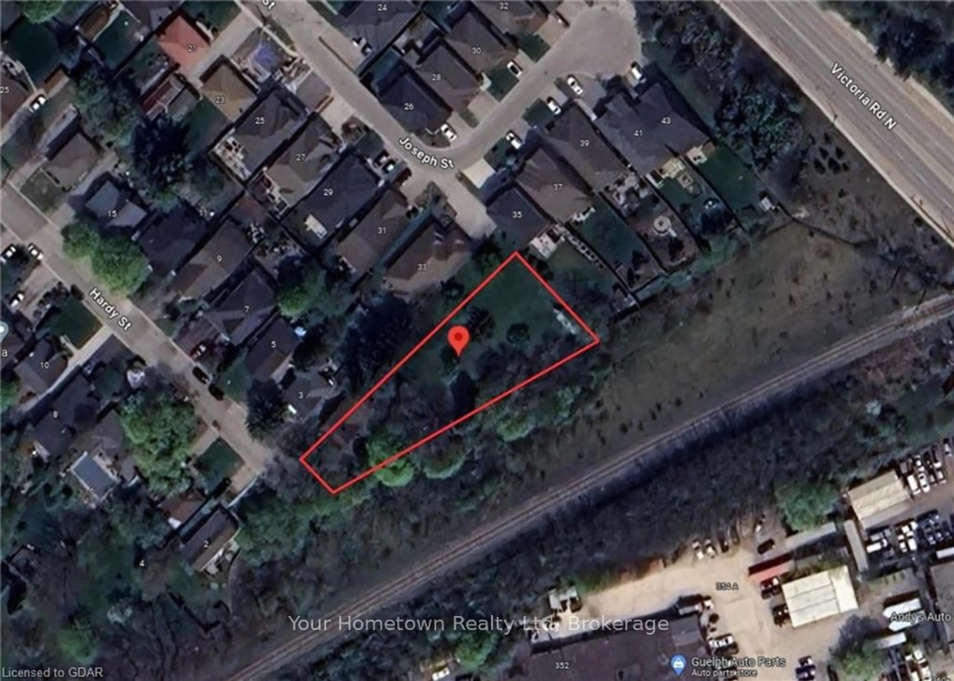 A pic from outside/outdoor area/front of a property/back of a property/a pic from drone, street for 1 HARDY St, Guelph Ontario N1E 5G4