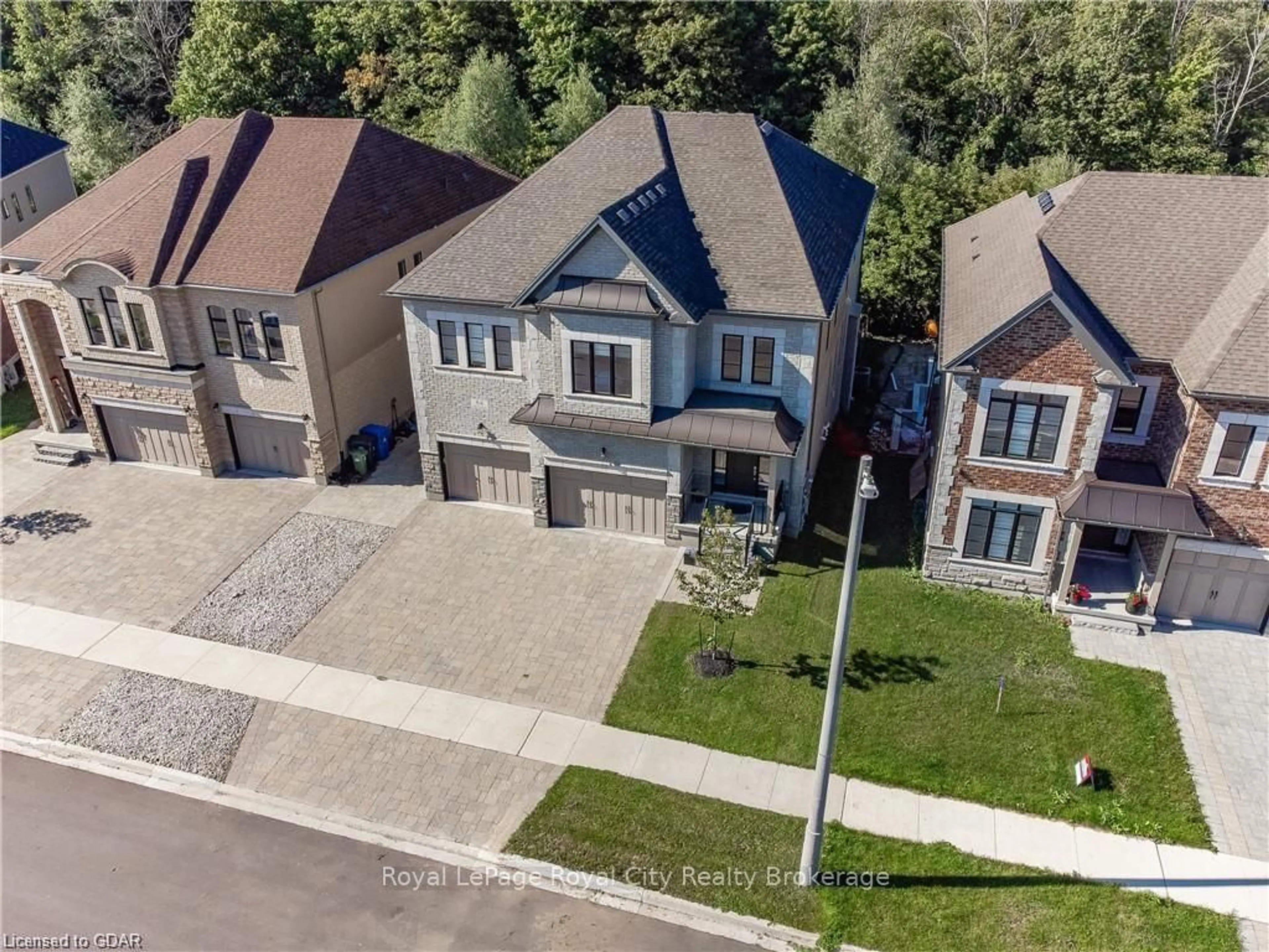 A pic from outside/outdoor area/front of a property/back of a property/a pic from drone, street for 84 MCCANN St, Guelph Ontario N1G 0B9