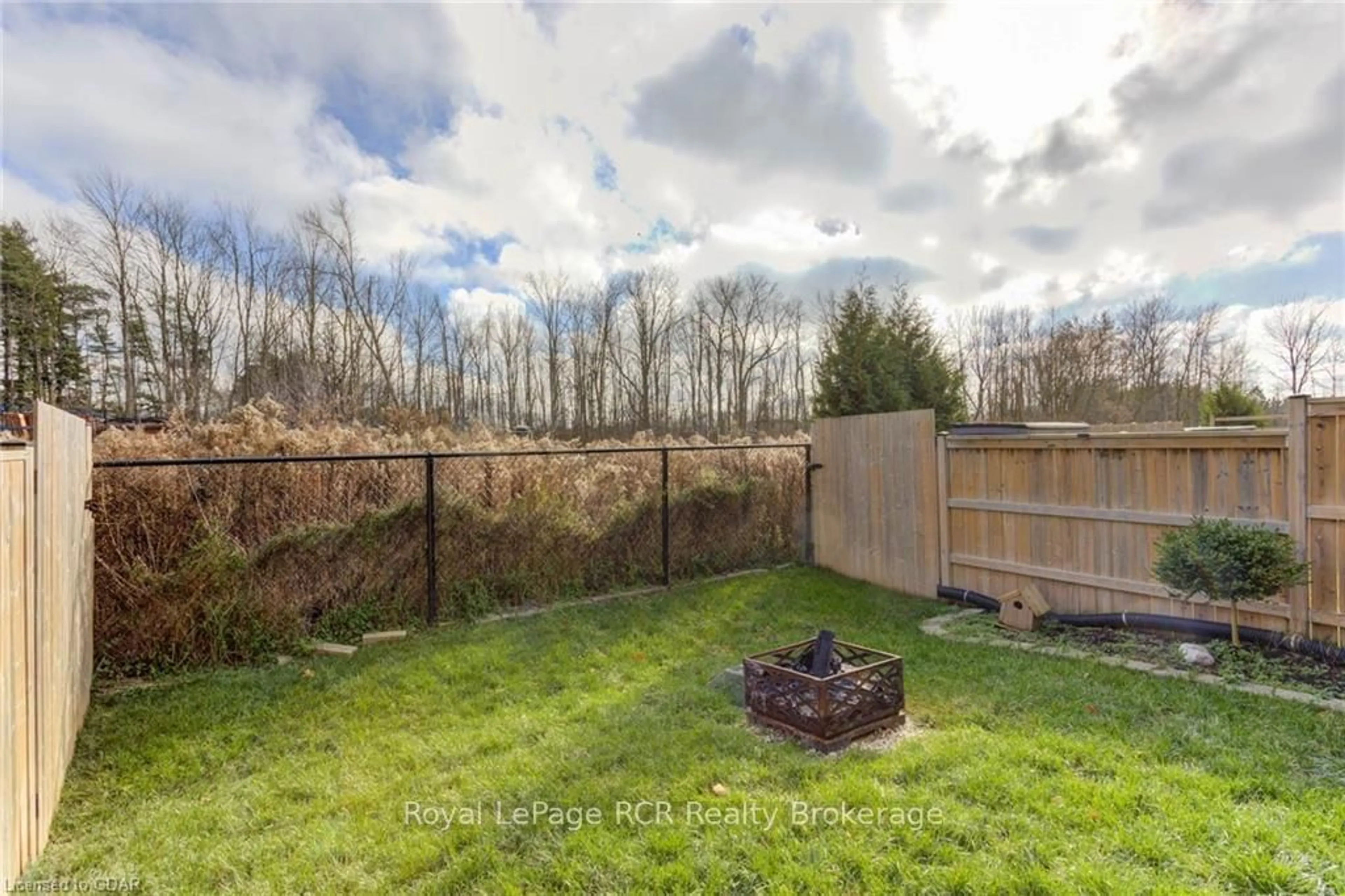 A pic from outside/outdoor area/front of a property/back of a property/a pic from drone, forest/trees view for 135 SAMUEL Dr, Wellington North Ontario N0G 1A0