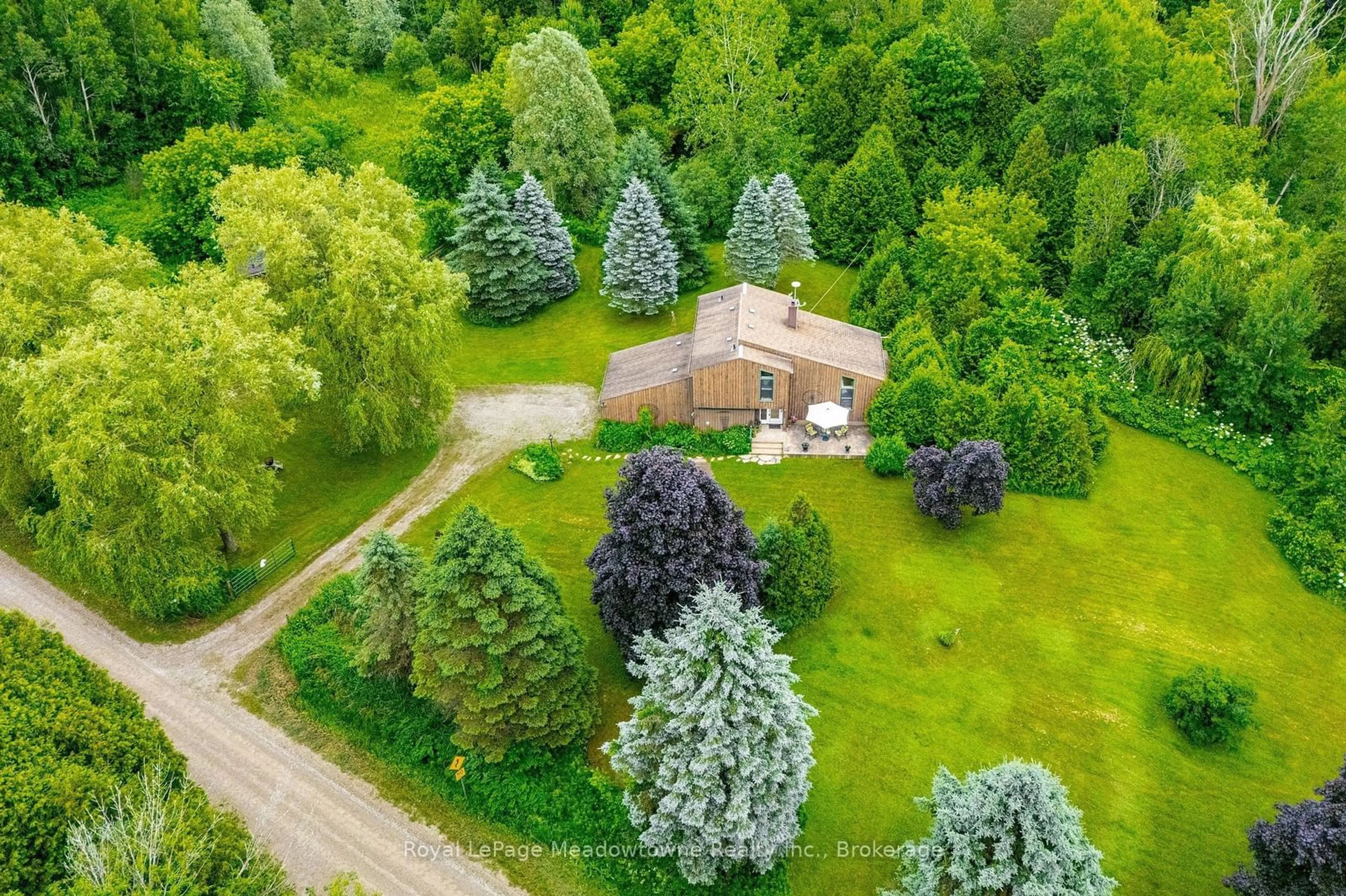 A pic from outside/outdoor area/front of a property/back of a property/a pic from drone, forest/trees view for 8633 30 SIDEROAD, Centre Wellington Ontario N0B 1J0