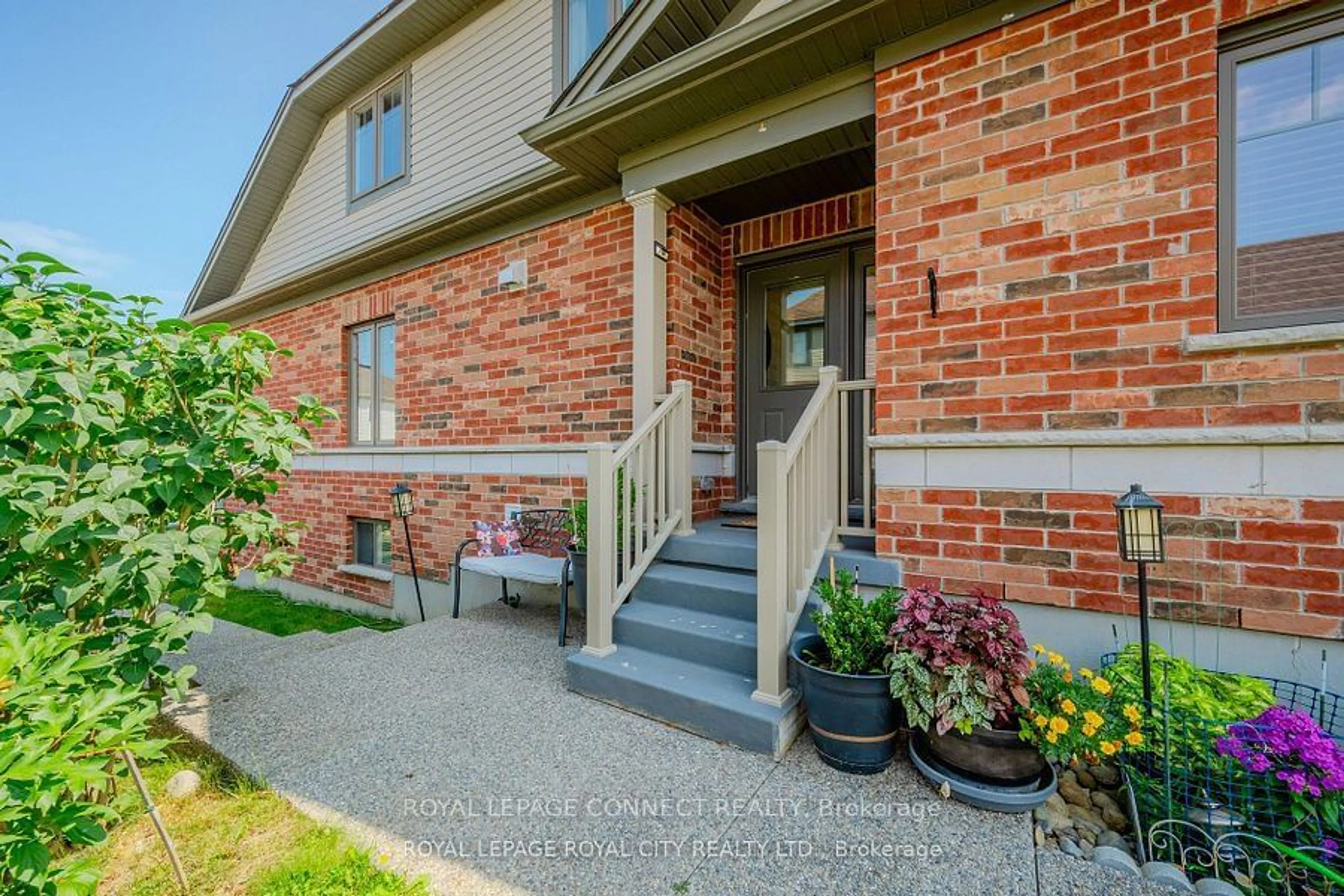 Home with brick exterior material, street for 205 Eden Oak Tr, Kitchener Ontario N2A 0H6