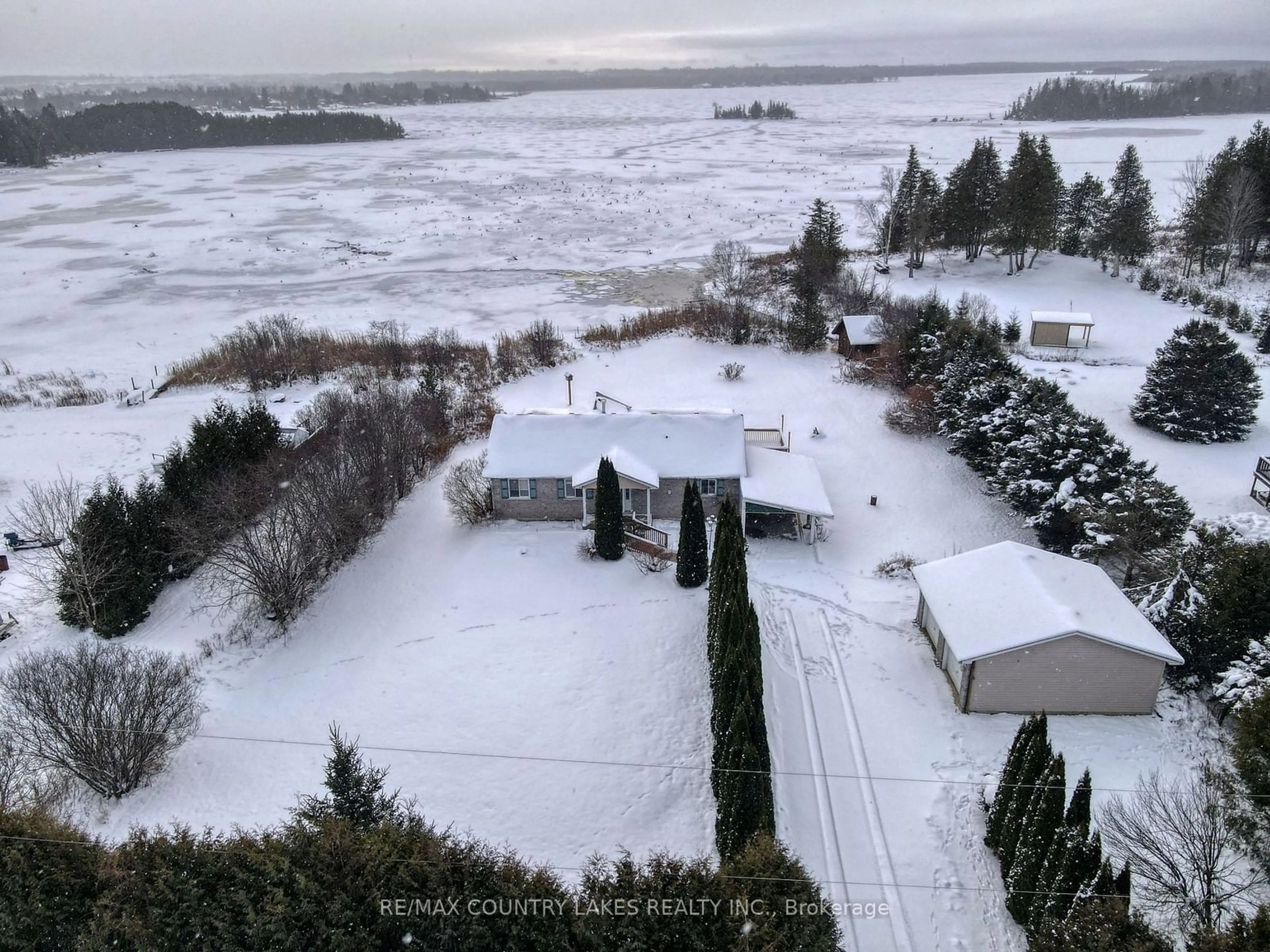 A pic from outside/outdoor area/front of a property/back of a property/a pic from drone, unknown for 586 Rohallion Rd, Kawartha Lakes Ontario L0K 1B0