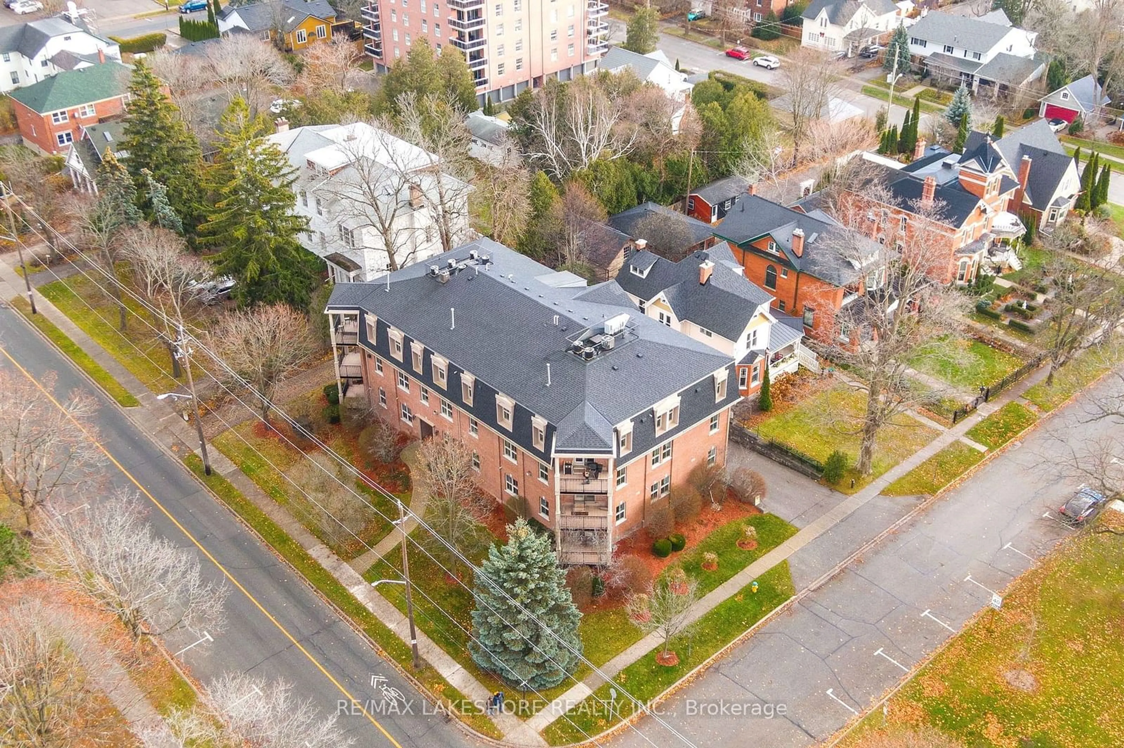 A pic from outside/outdoor area/front of a property/back of a property/a pic from drone, unknown for 220 Church St #101, Cobourg Ontario K9A 3V9