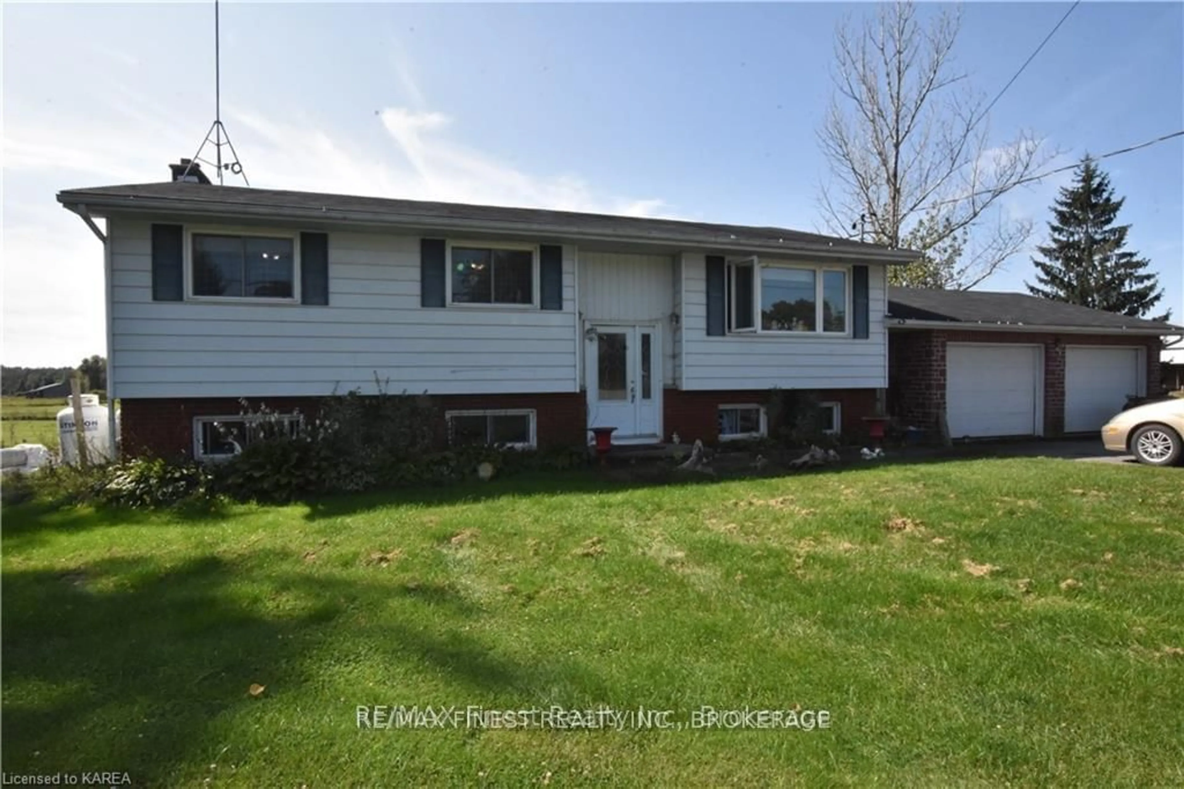 Home with vinyl exterior material, street for 7072 COUNTY ROAD 2, Loyalist Ontario K7R 3K6