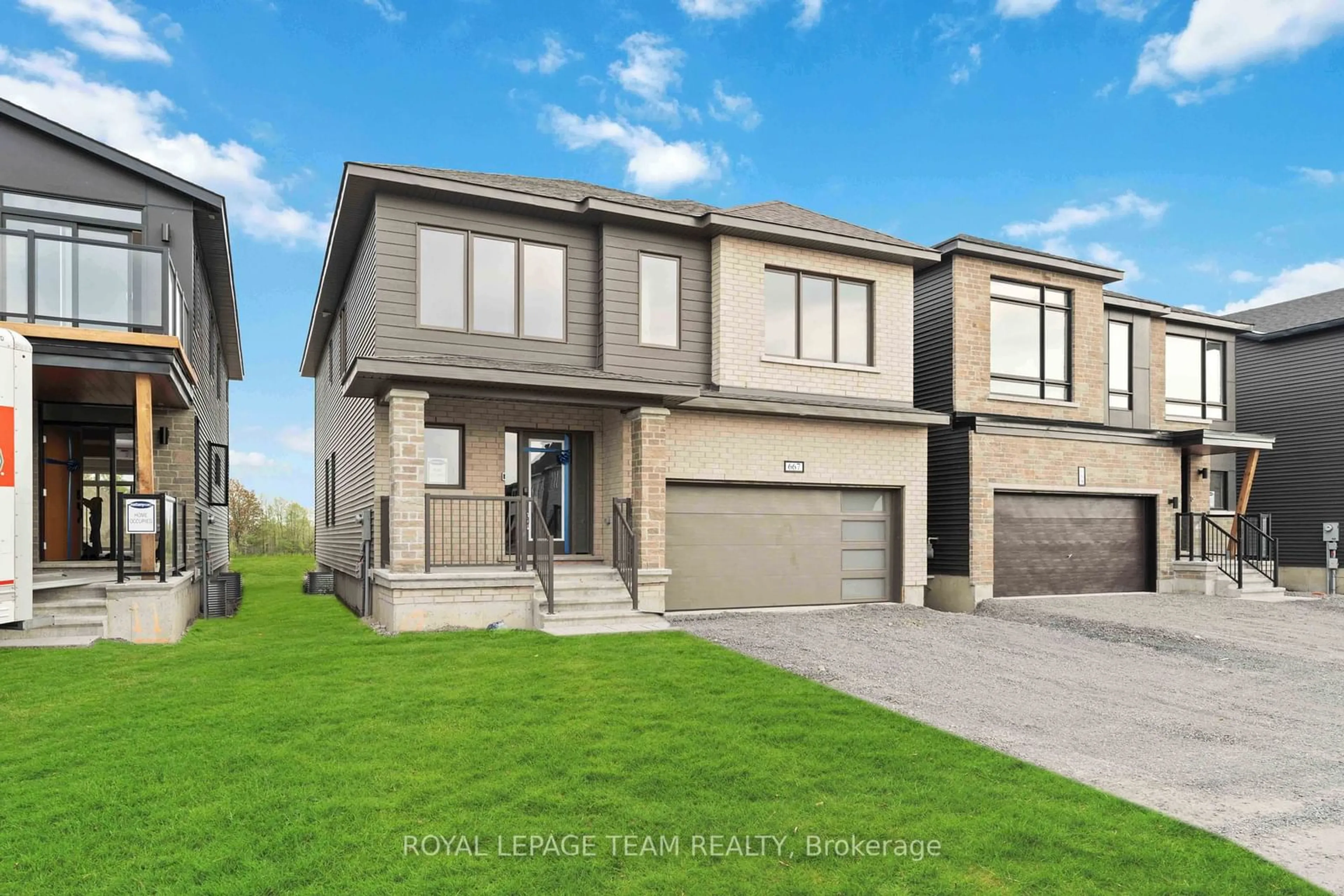 Home with brick exterior material, street for 667 FENWICK Way, Barrhaven Ontario K2C 3H2