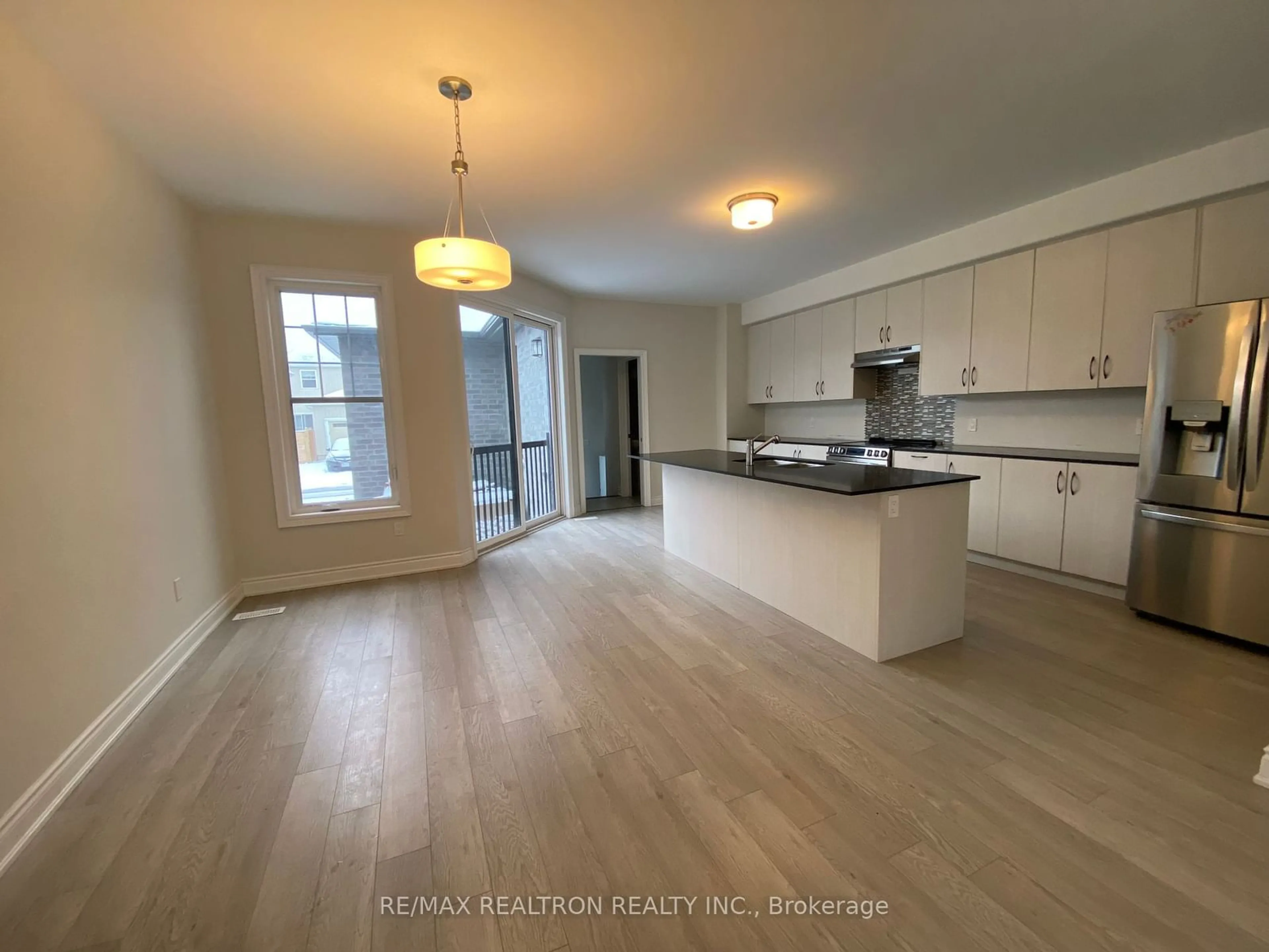 Open concept kitchen, wood/laminate floor for 1071 Rippingale Tr, Peterborough Ontario K9H 0J8