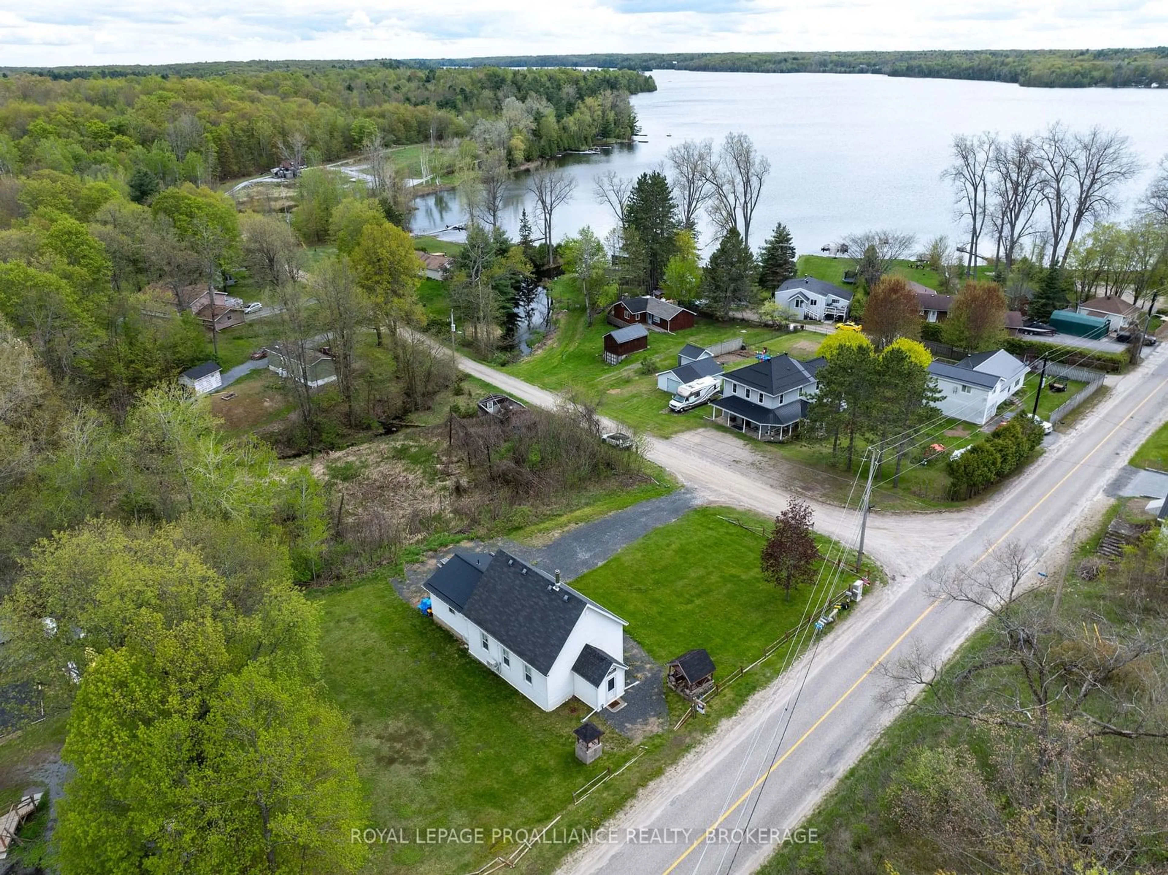 A pic from outside/outdoor area/front of a property/back of a property/a pic from drone, water/lake/river/ocean view for 1867 Crow Lake Rd, Central Frontenac Ontario K0H 2B0