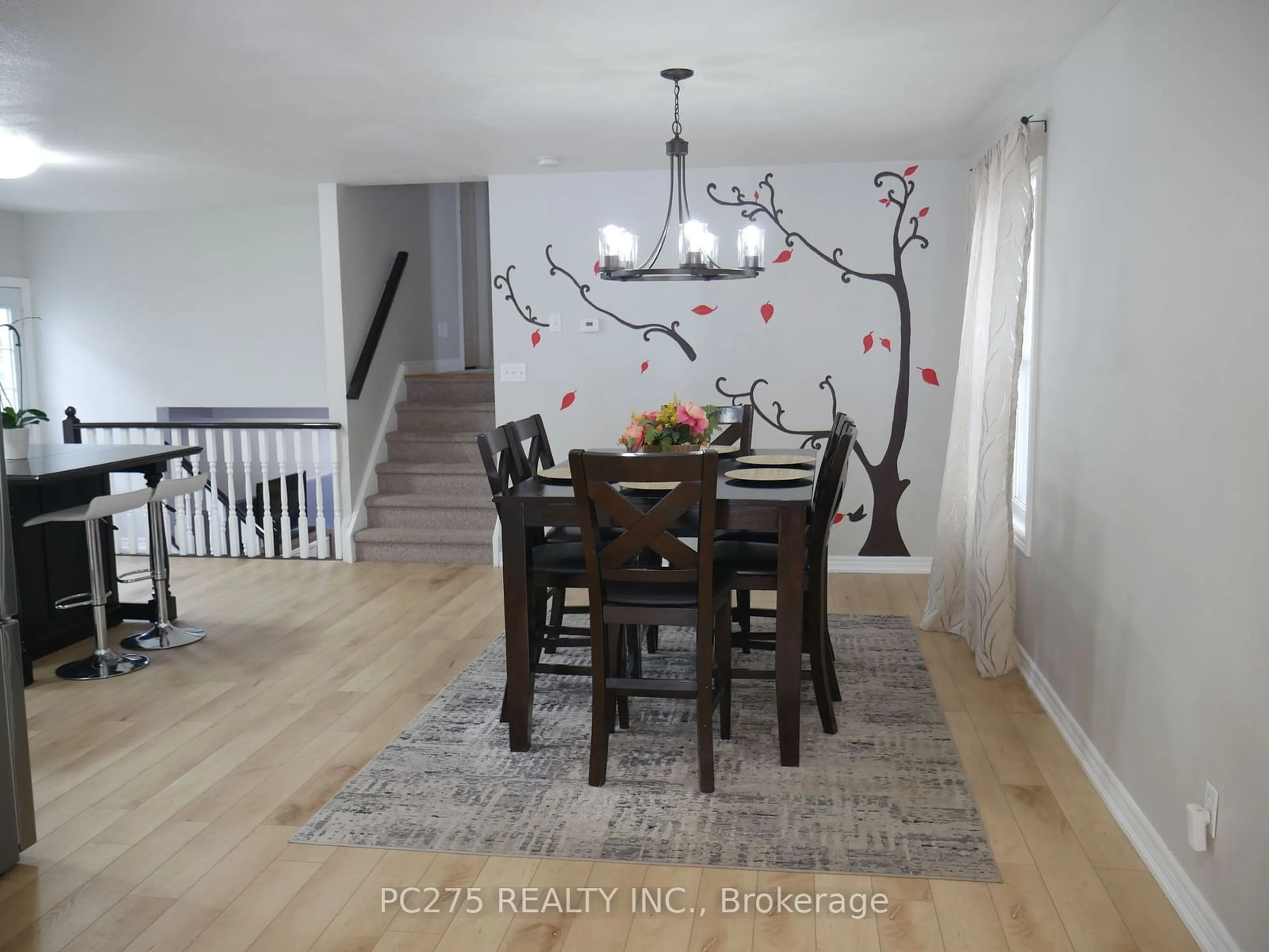 Dining room, wood/laminate floor for 547 Ontario St, Woodstock Ontario N4V 1H2