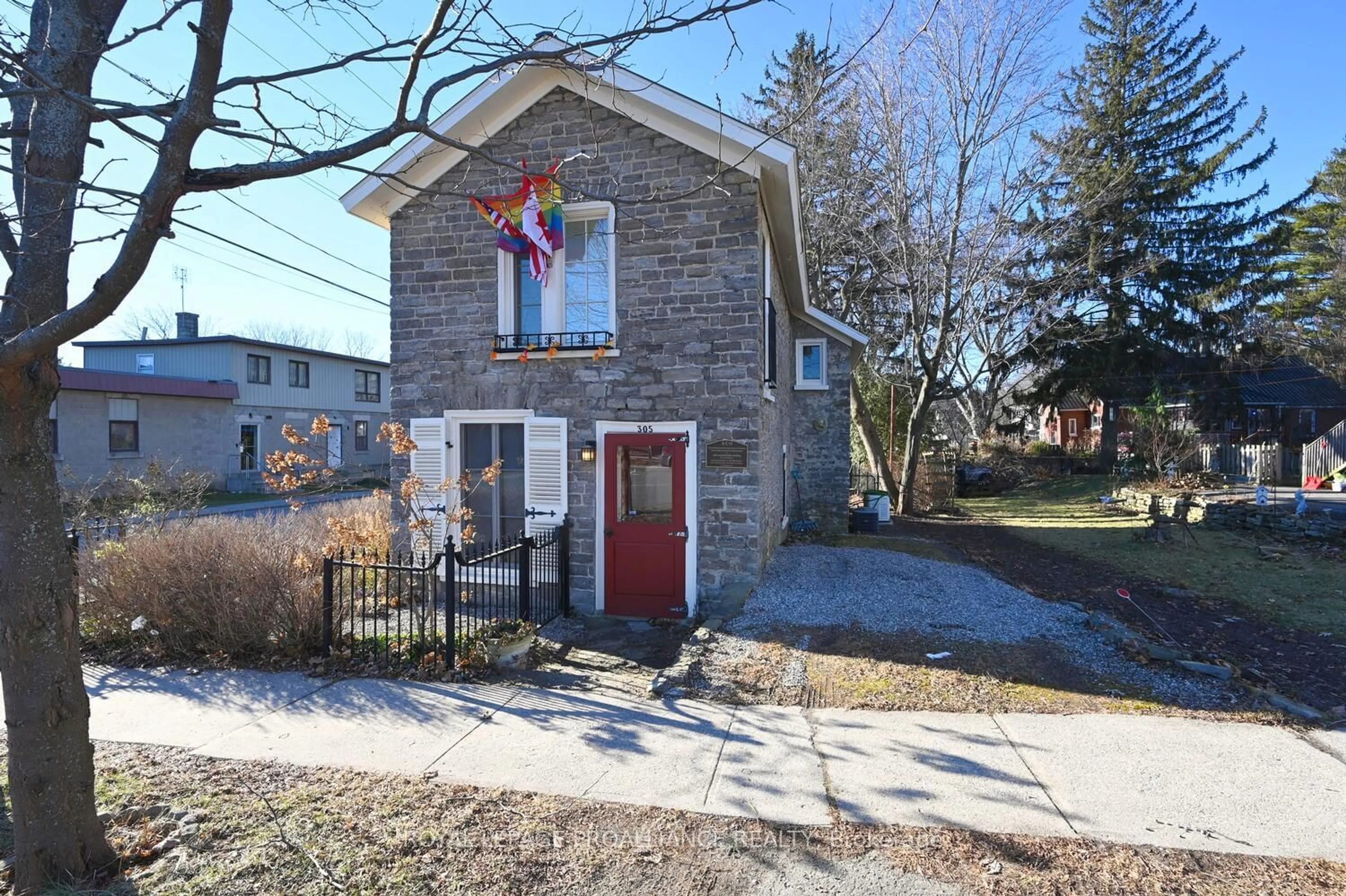 Home with brick exterior material, street for 305 Centre St, Prescott Ontario K0E 1T0